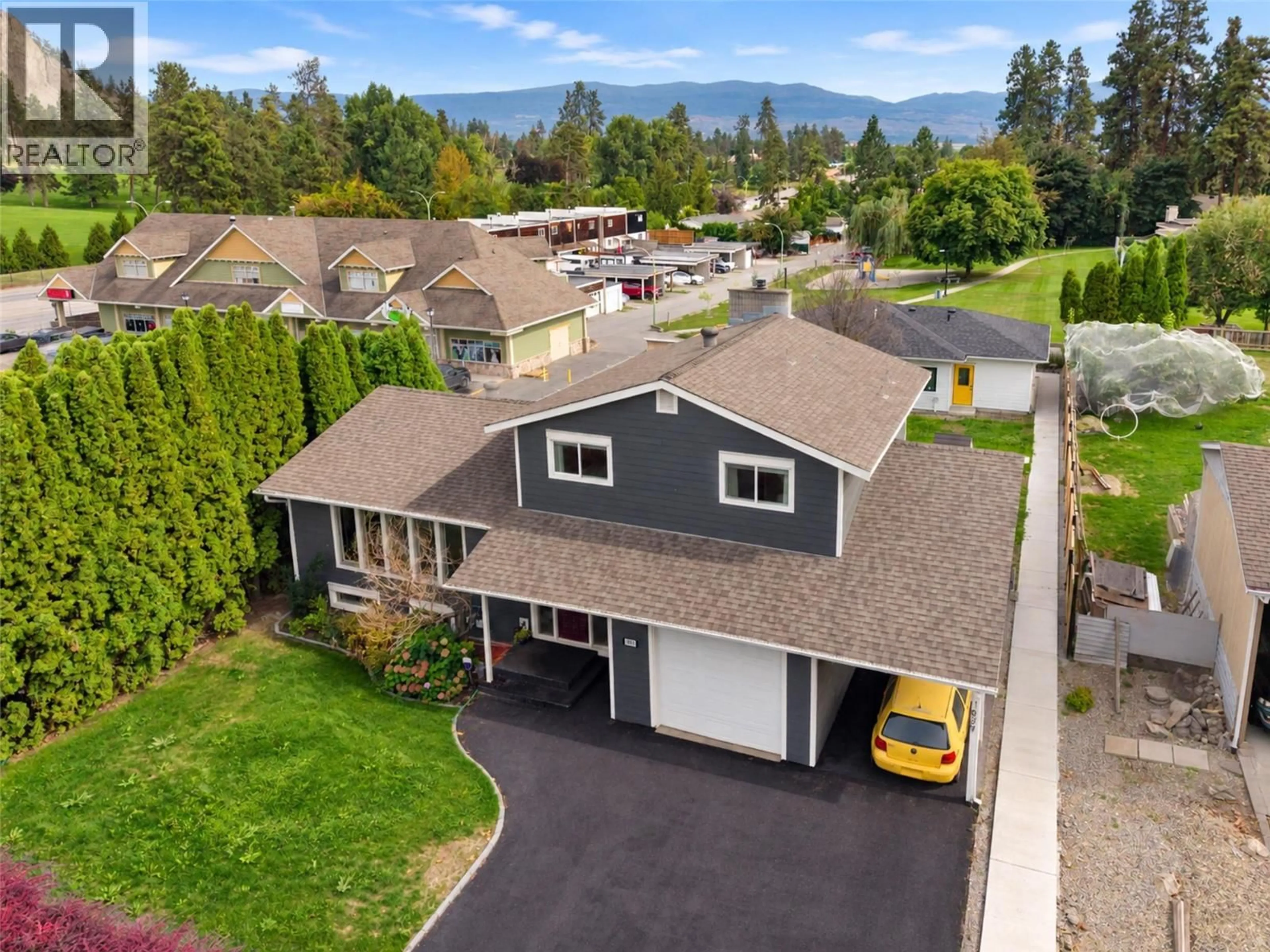 A pic from outside/outdoor area/front of a property/back of a property/a pic from drone, mountain view for 1859-1861 MOUNTAIN AVENUE, Kelowna British Columbia V1Y7J4