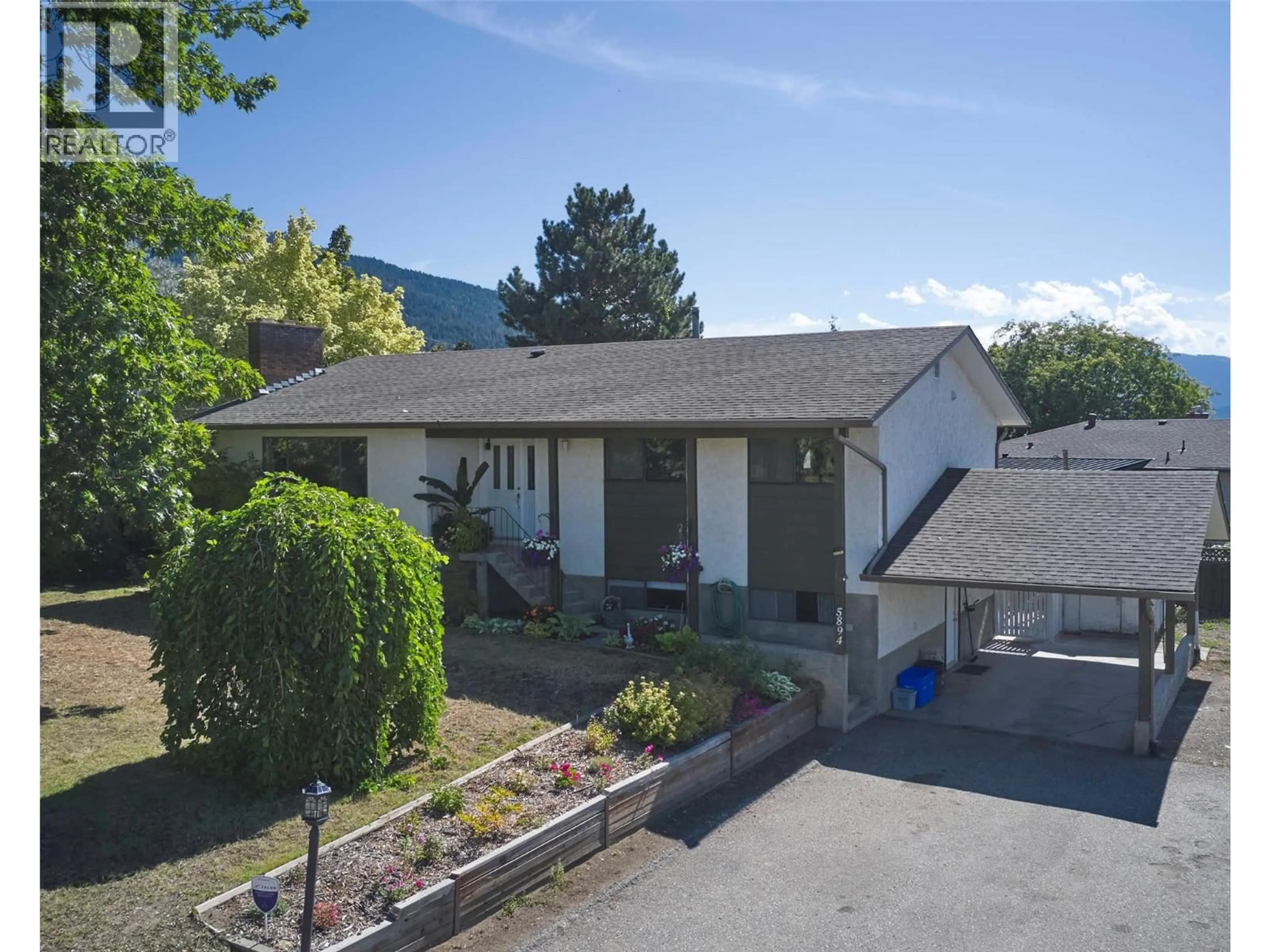A pic from outside/outdoor area/front of a property/back of a property/a pic from drone, mountain view for 5894 DEDECKER WEST ROAD, Vernon British Columbia V1B3P9