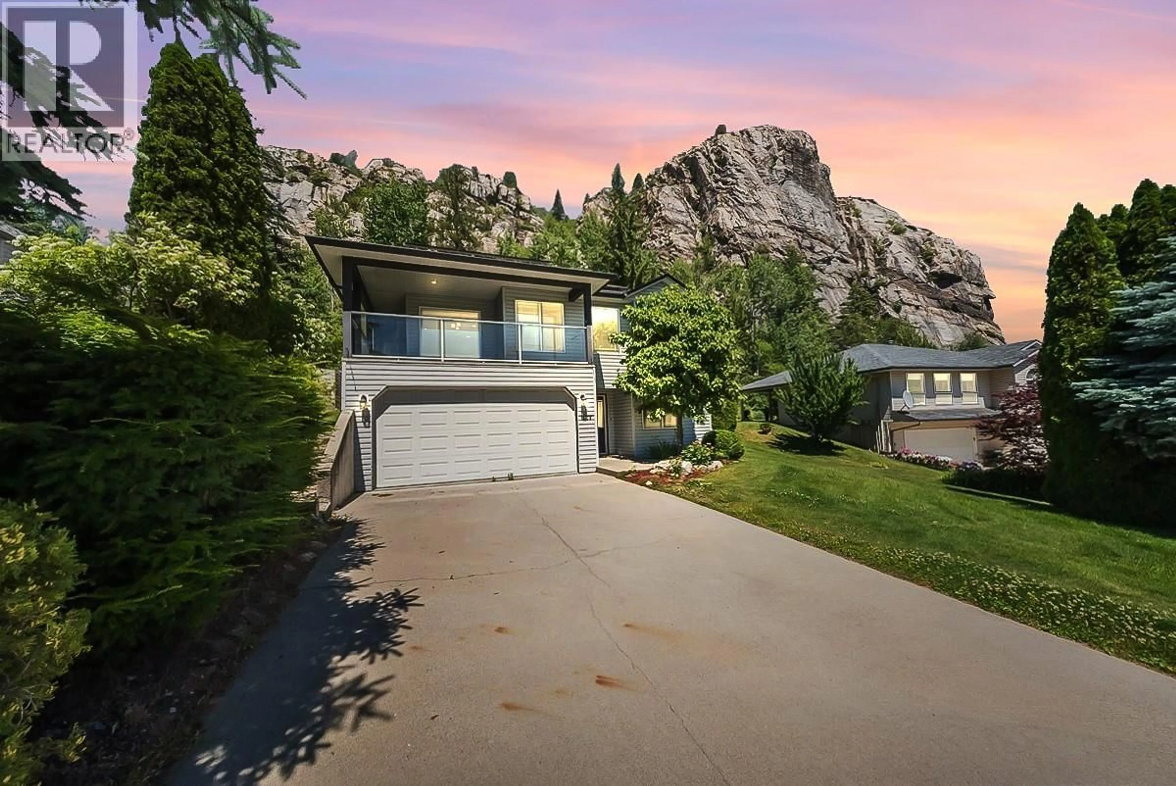 A pic from outside/outdoor area/front of a property/back of a property/a pic from drone, mountain view for 1479 37TH STREET, Castlegar British Columbia V1N4J5