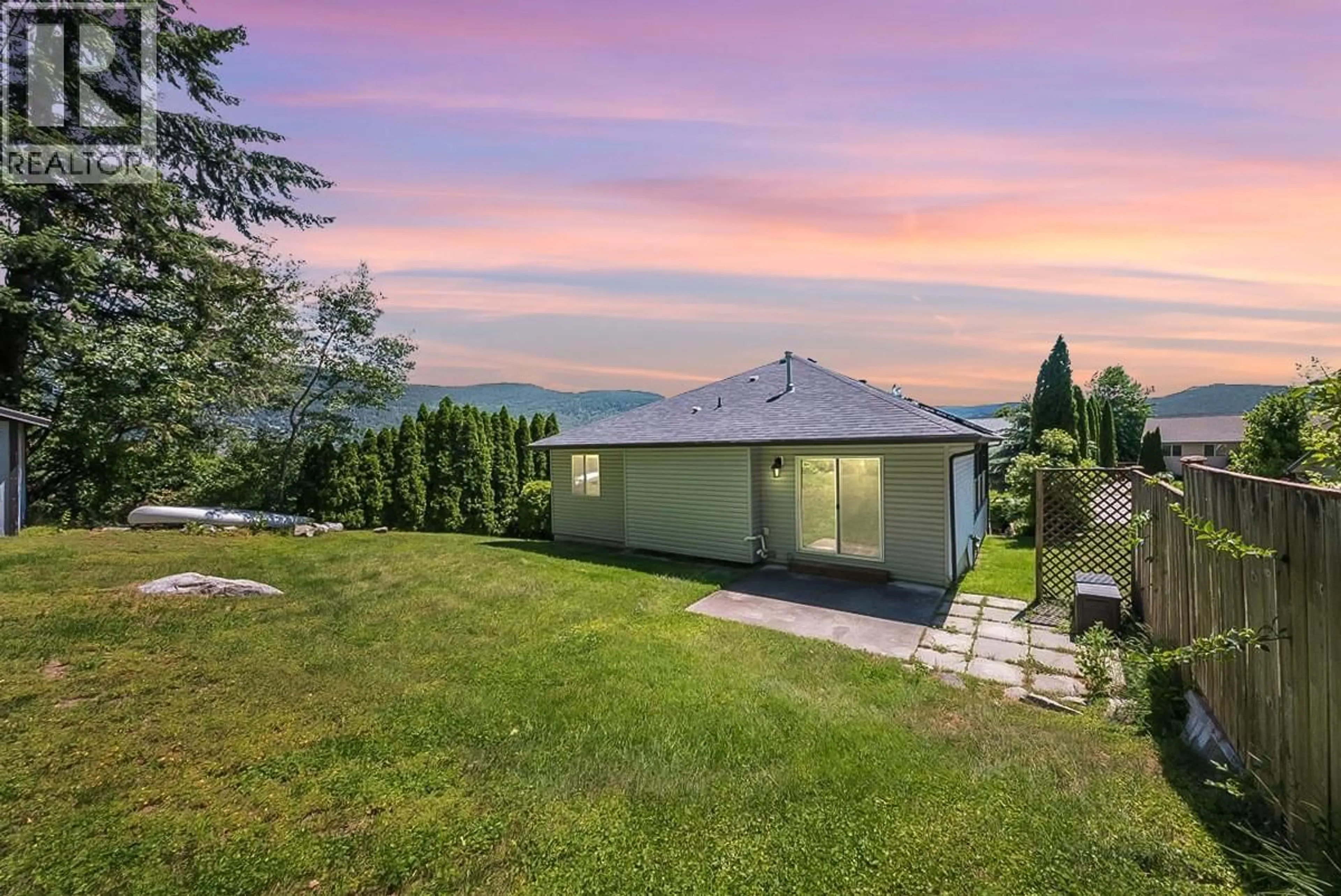 A pic from outside/outdoor area/front of a property/back of a property/a pic from drone, mountain view for 1479 37TH STREET, Castlegar British Columbia V1N4J5