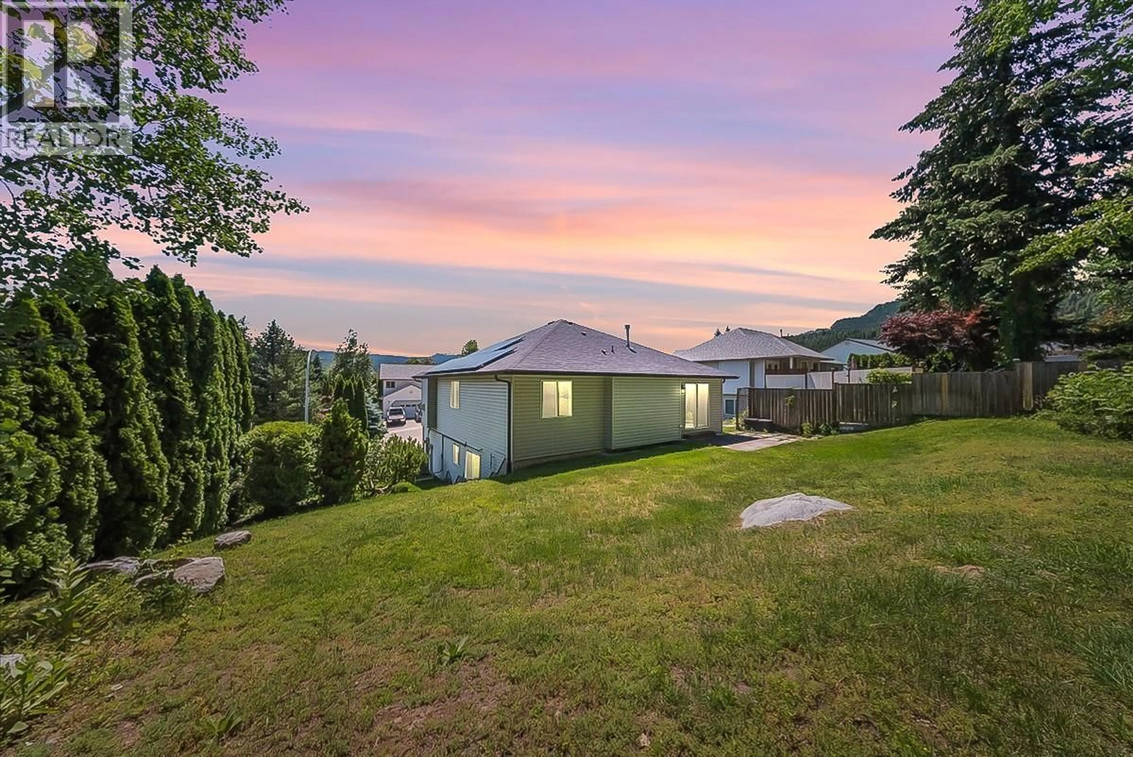 A pic from outside/outdoor area/front of a property/back of a property/a pic from drone, mountain view for 1479 37TH STREET, Castlegar British Columbia V1N4J5