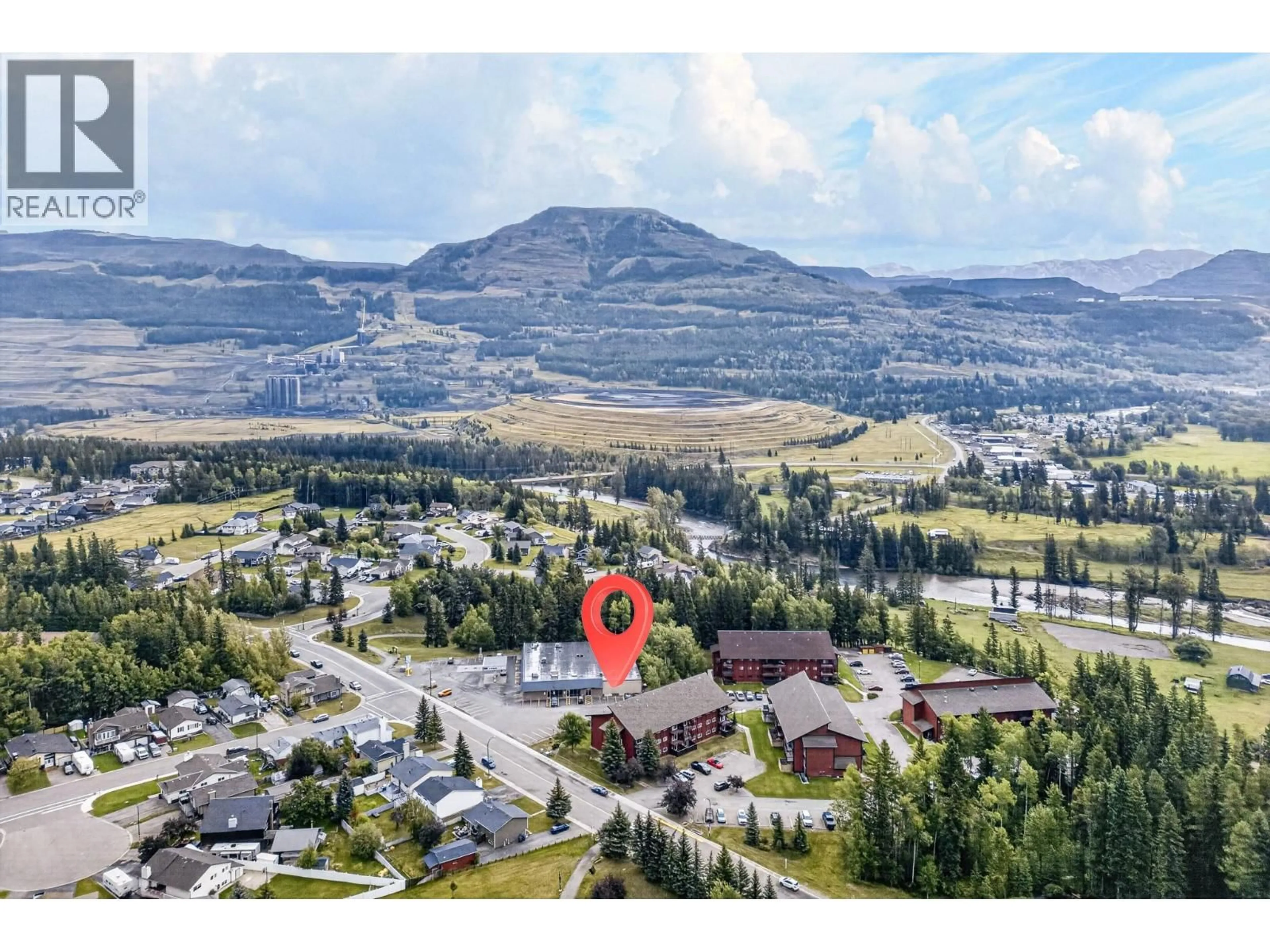 A pic from outside/outdoor area/front of a property/back of a property/a pic from drone, mountain view for 105A - 1286 PONDEROSA DRIVE, Sparwood British Columbia V0B2G2