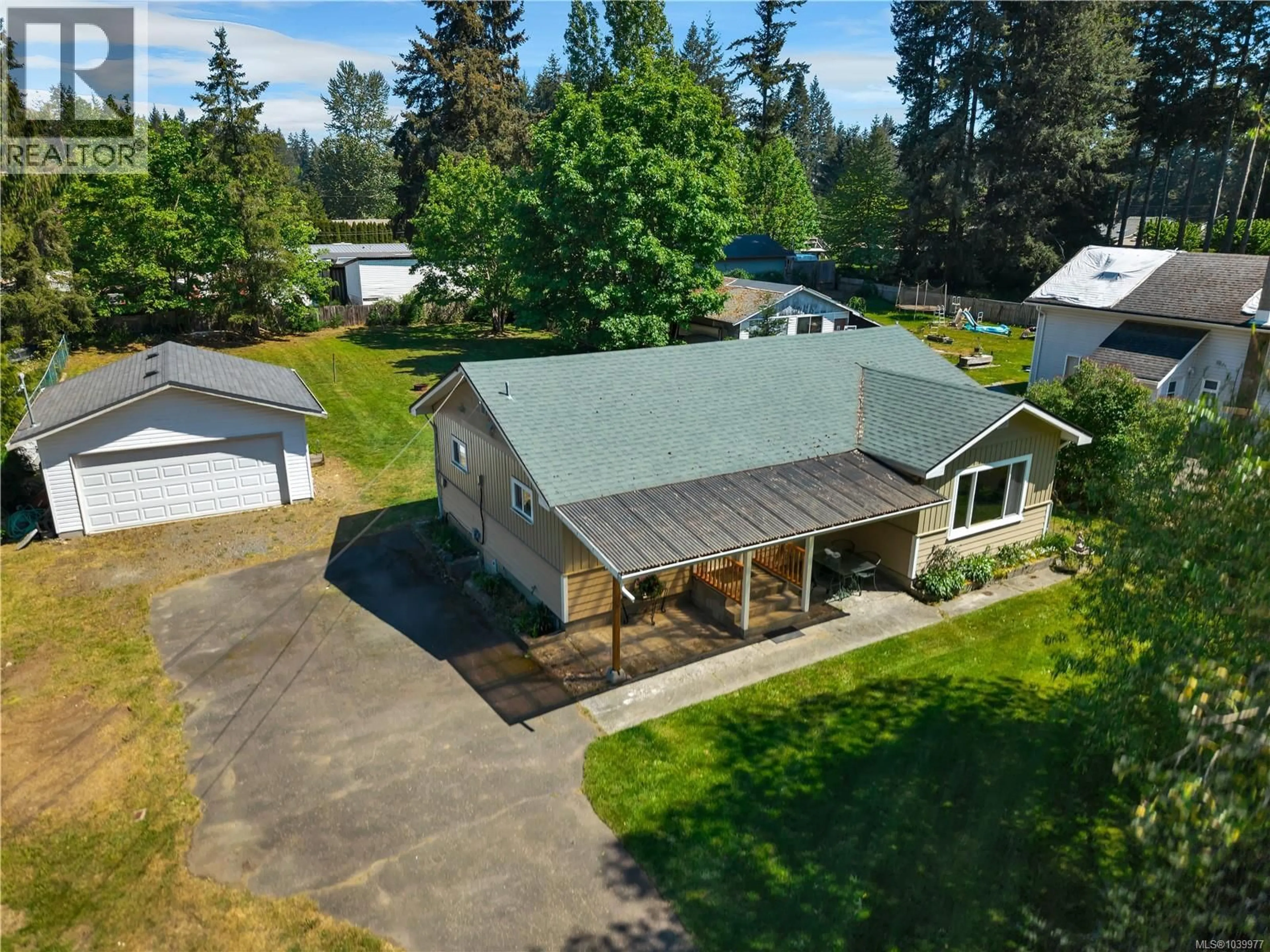 A pic from outside/outdoor area/front of a property/back of a property/a pic from drone, street for 4800 LEWIS ROAD, Campbell River British Columbia V9H1C4
