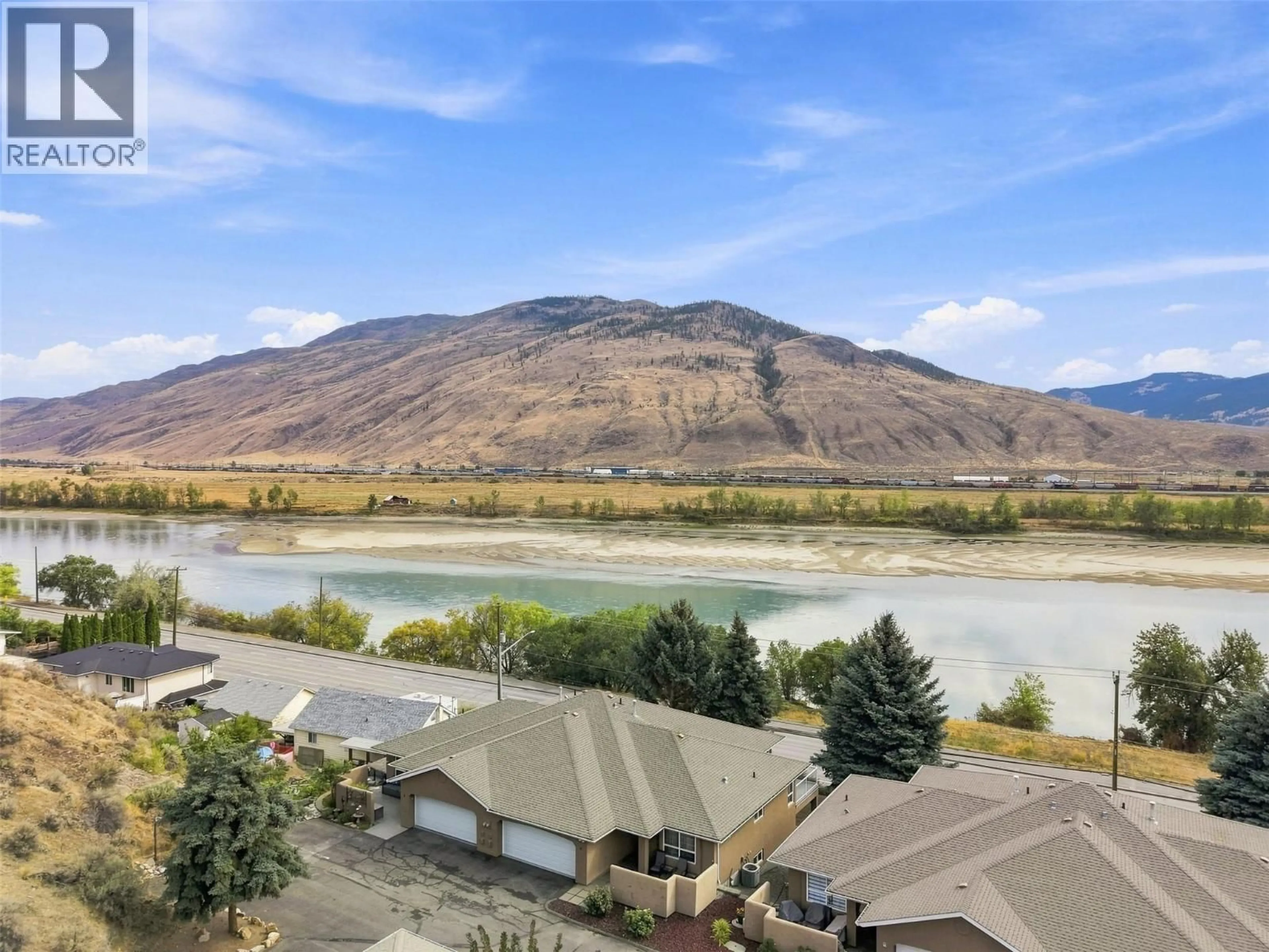 A pic from outside/outdoor area/front of a property/back of a property/a pic from drone, water/lake/river/ocean view for 7 - 810 ANDERSON TERRACE, Kamloops British Columbia V2B6E2
