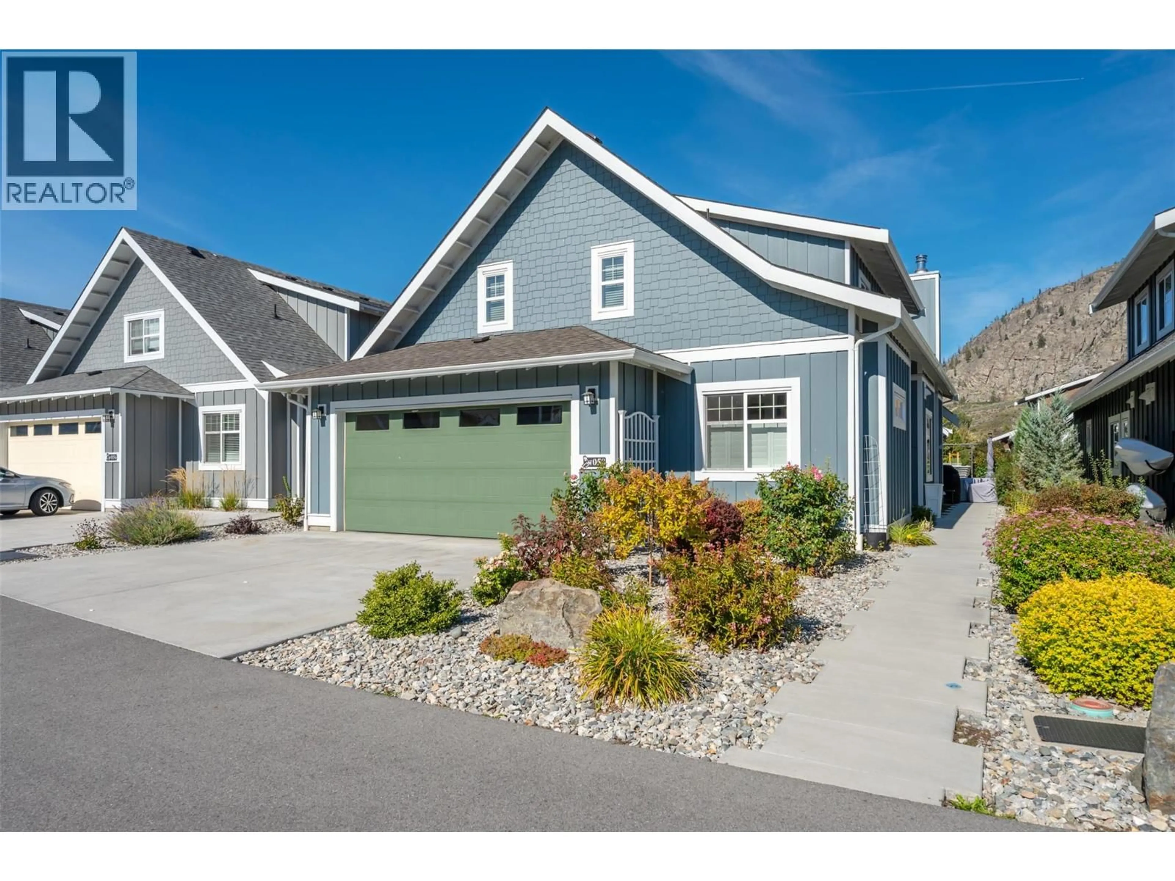 Home with vinyl exterior material, street for 58 - 2450 RADIO TOWER ROAD, Oliver British Columbia V0H1T1