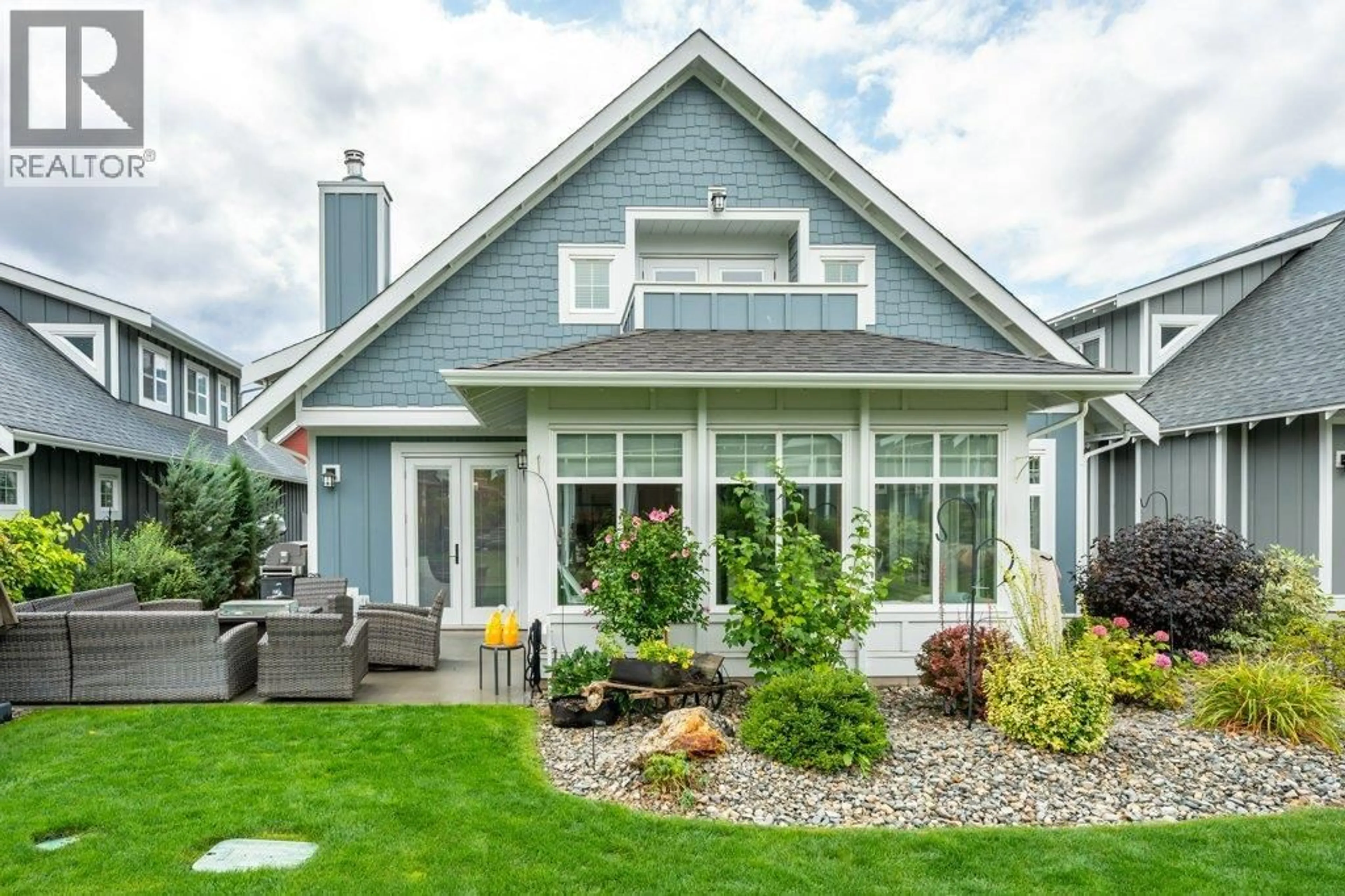 Home with vinyl exterior material, street for 58 - 2450 RADIO TOWER ROAD, Oliver British Columbia V0H1T1