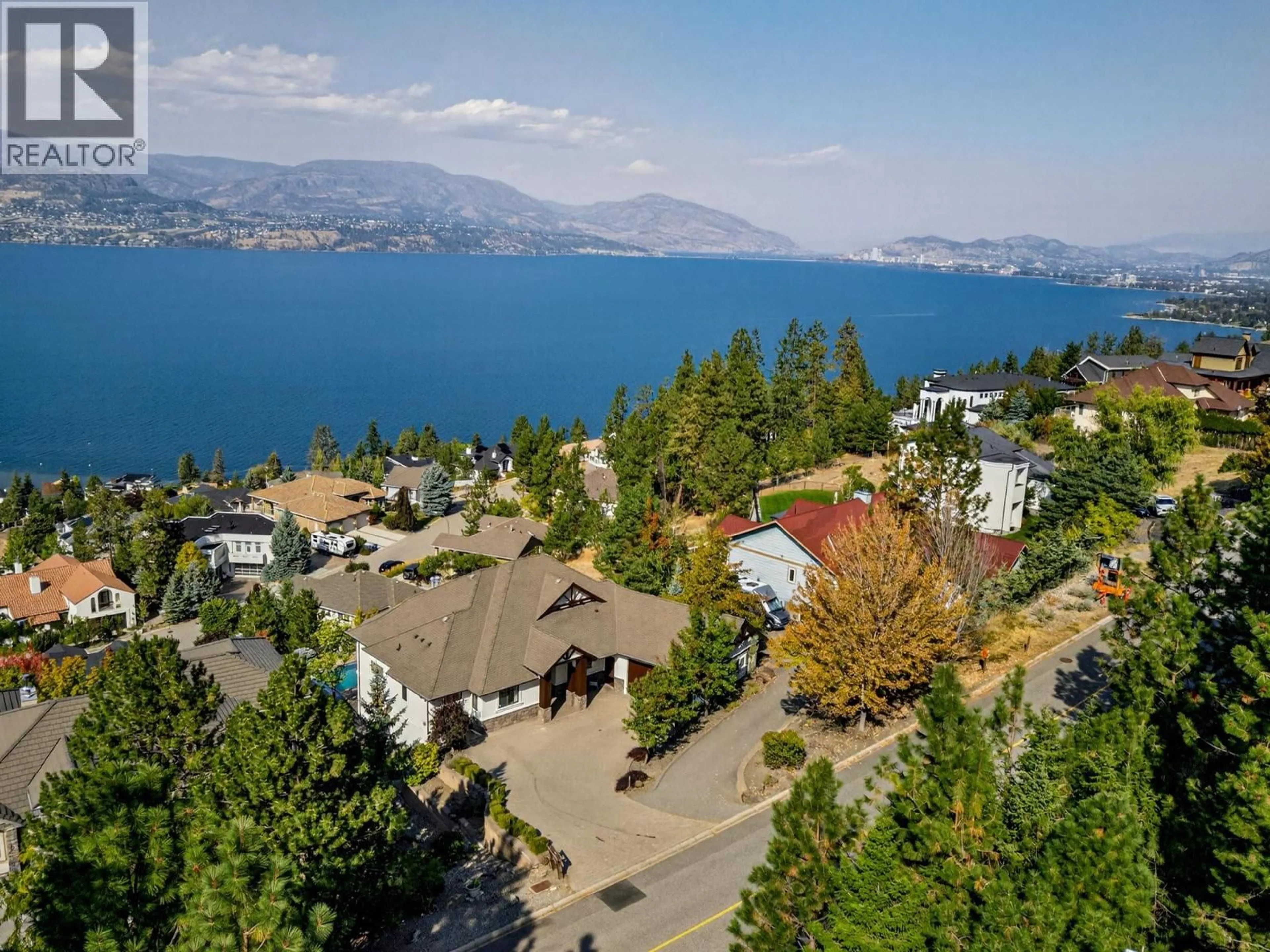 A pic from outside/outdoor area/front of a property/back of a property/a pic from drone, water/lake/river/ocean view for 390 OKAVIEW ROAD, Kelowna British Columbia V1W4K3