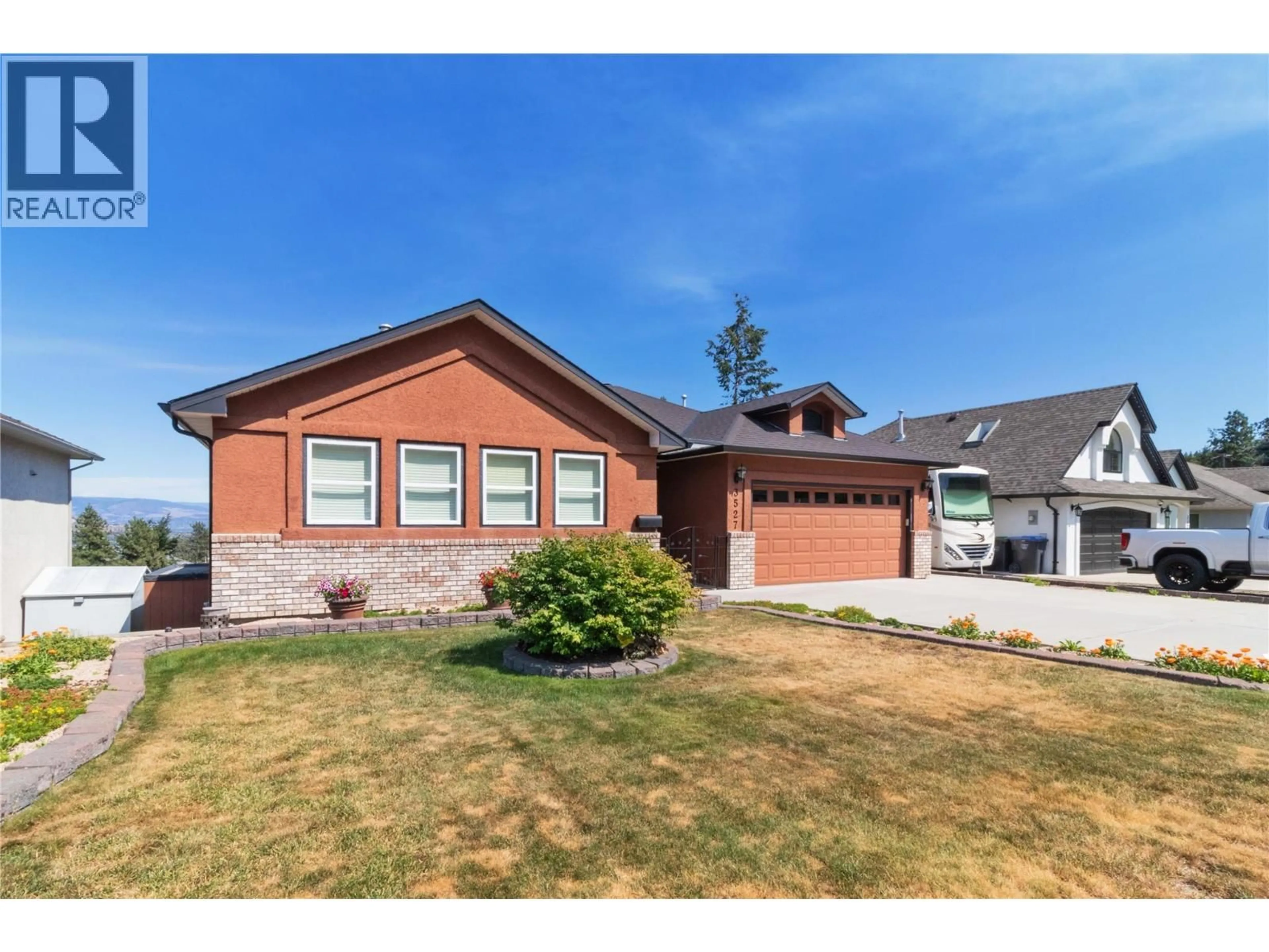 Home with brick exterior material, street for 3527 GLEN EAGLES DRIVE, West Kelowna British Columbia V4T2L6
