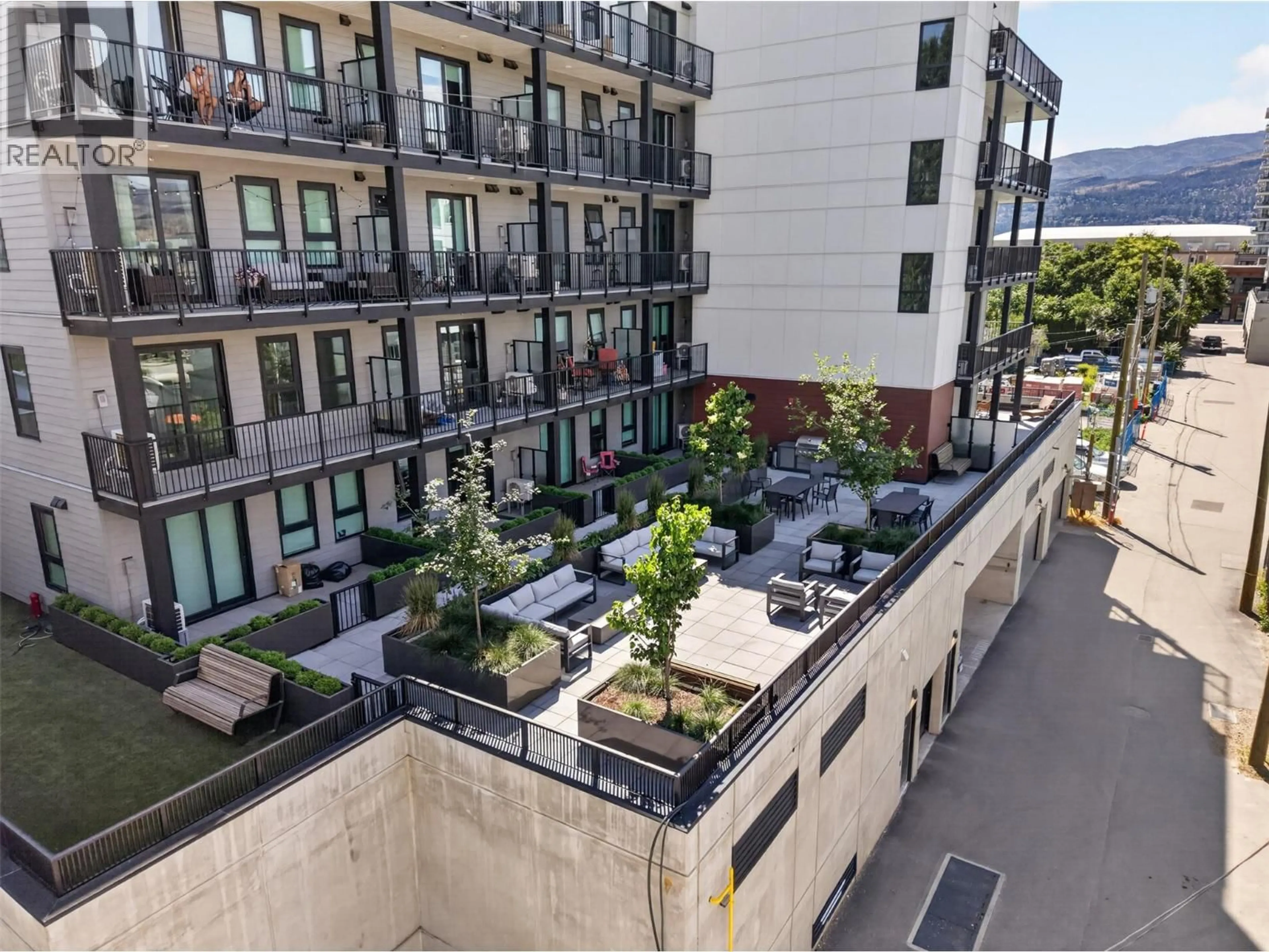 A pic from outside/outdoor area/front of a property/back of a property/a pic from drone, city buildings view from balcony for 211 - 620 CORONATION AVENUE, Kelowna British Columbia V1Y0N8
