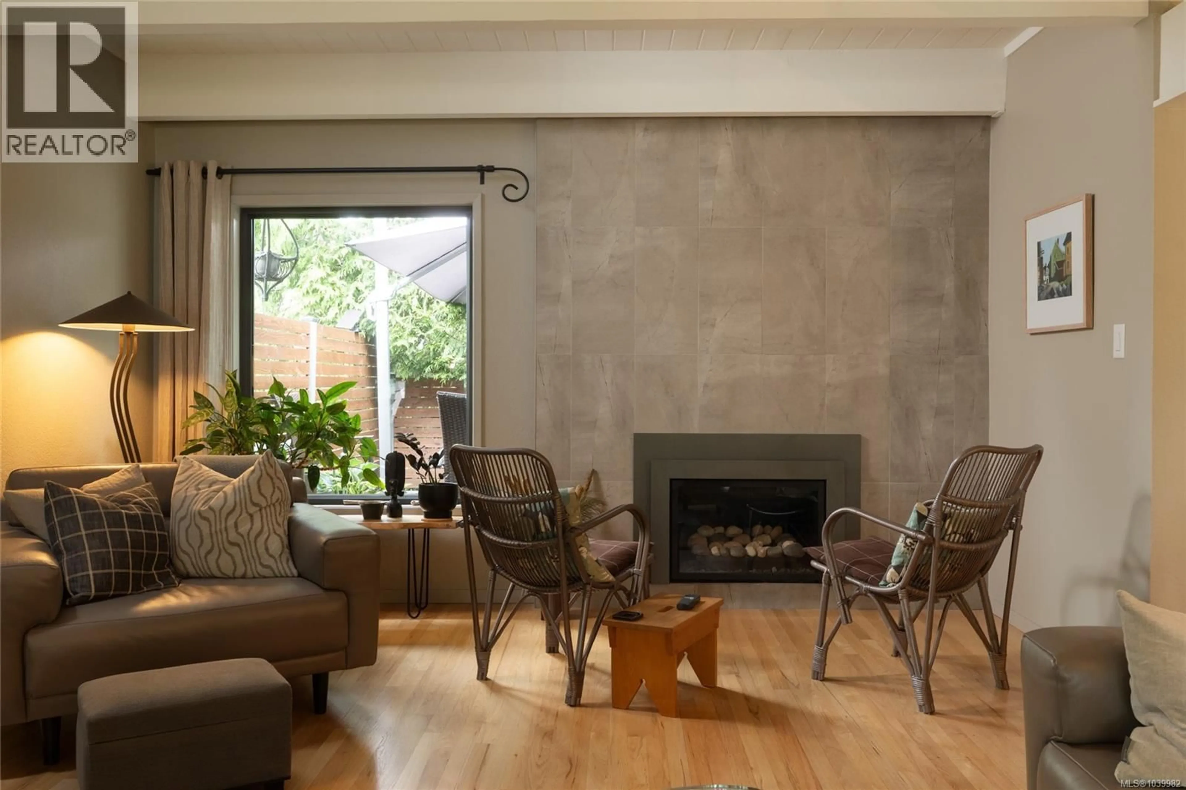 Living room with furniture, cement floor for 1286 PIKE STREET, Saanich British Columbia V8P1W3
