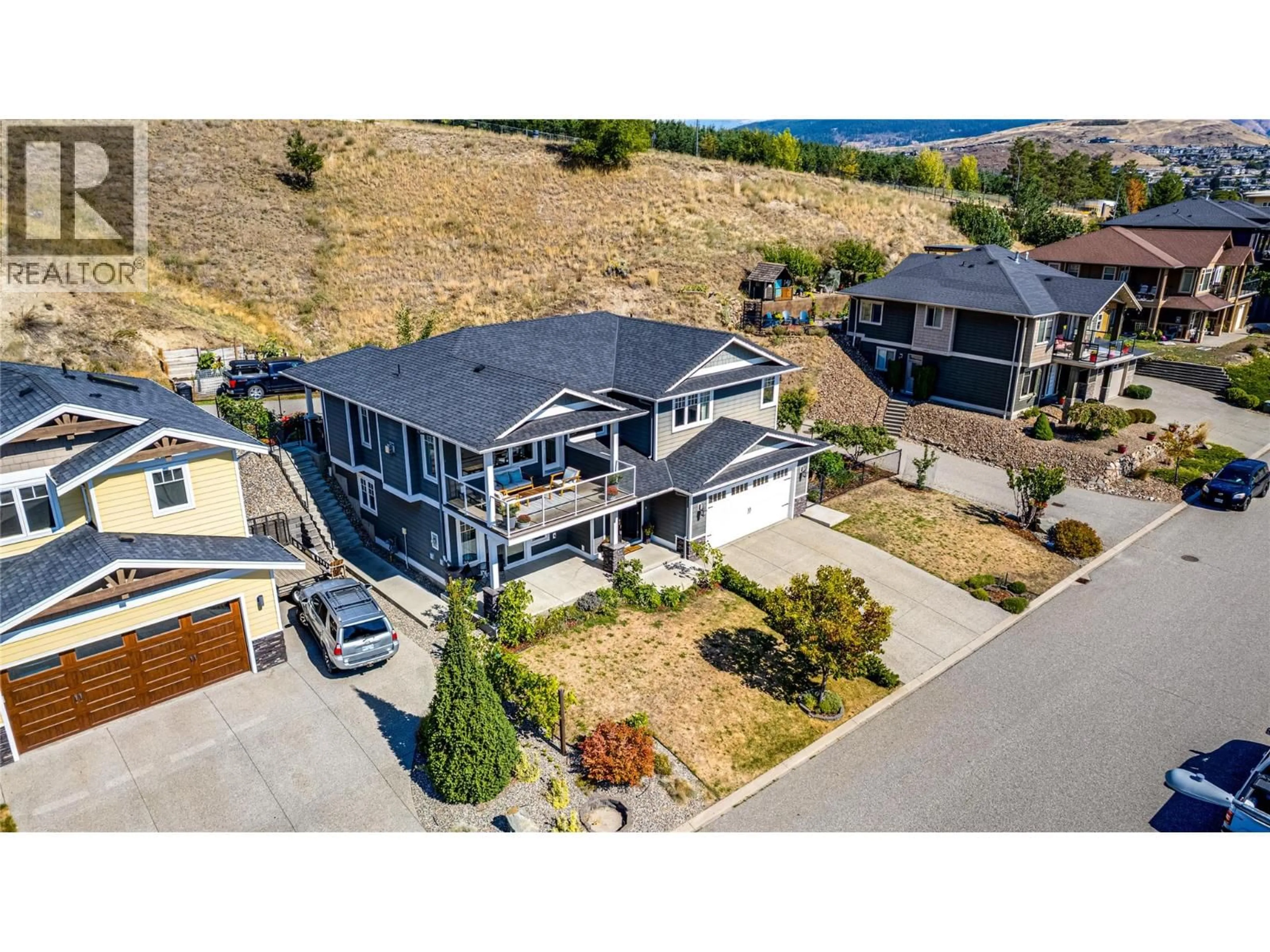 A pic from outside/outdoor area/front of a property/back of a property/a pic from drone, mountain view for 7221 EDGEWATER PLACE, Coldstream British Columbia V1B4C5