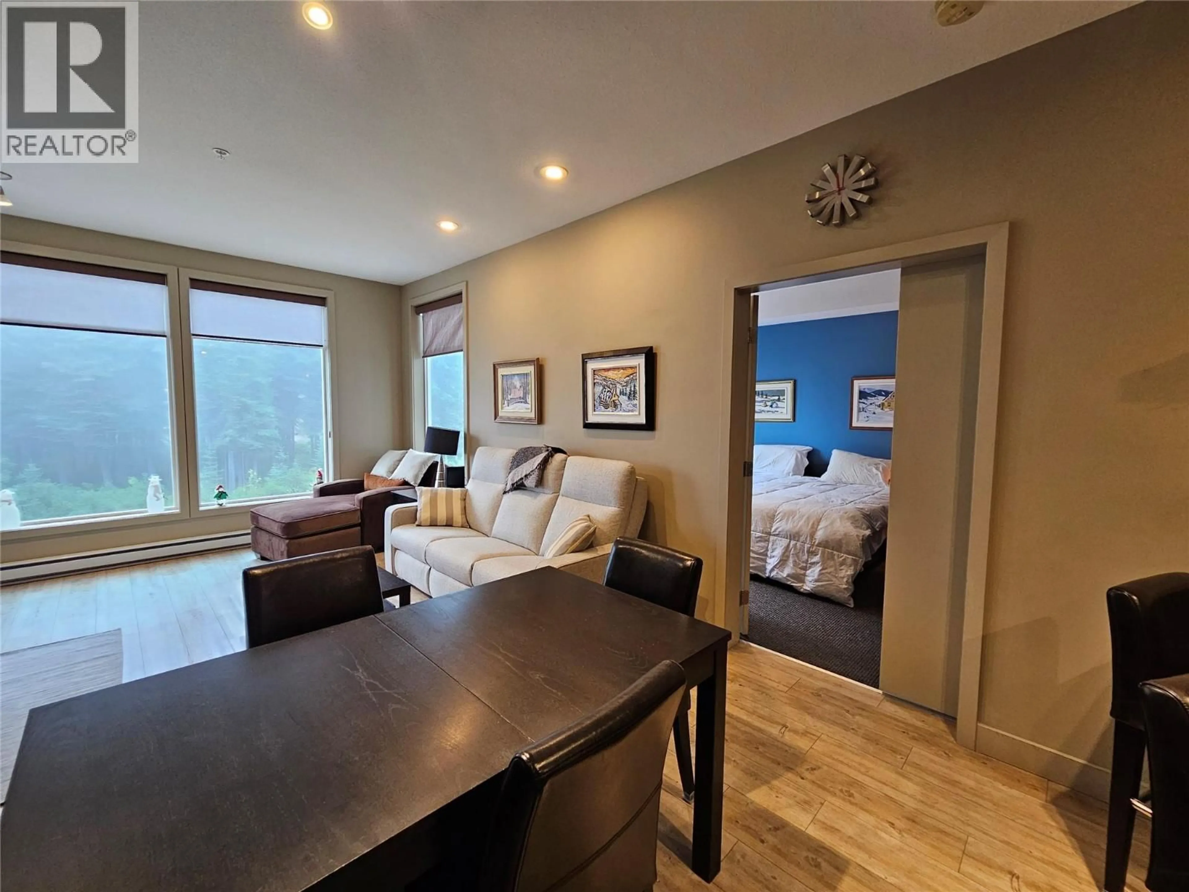 Living room with furniture, wood/laminate floor for 208 - 30 MONASHEE ROAD, Silver Star British Columbia V1B3M1