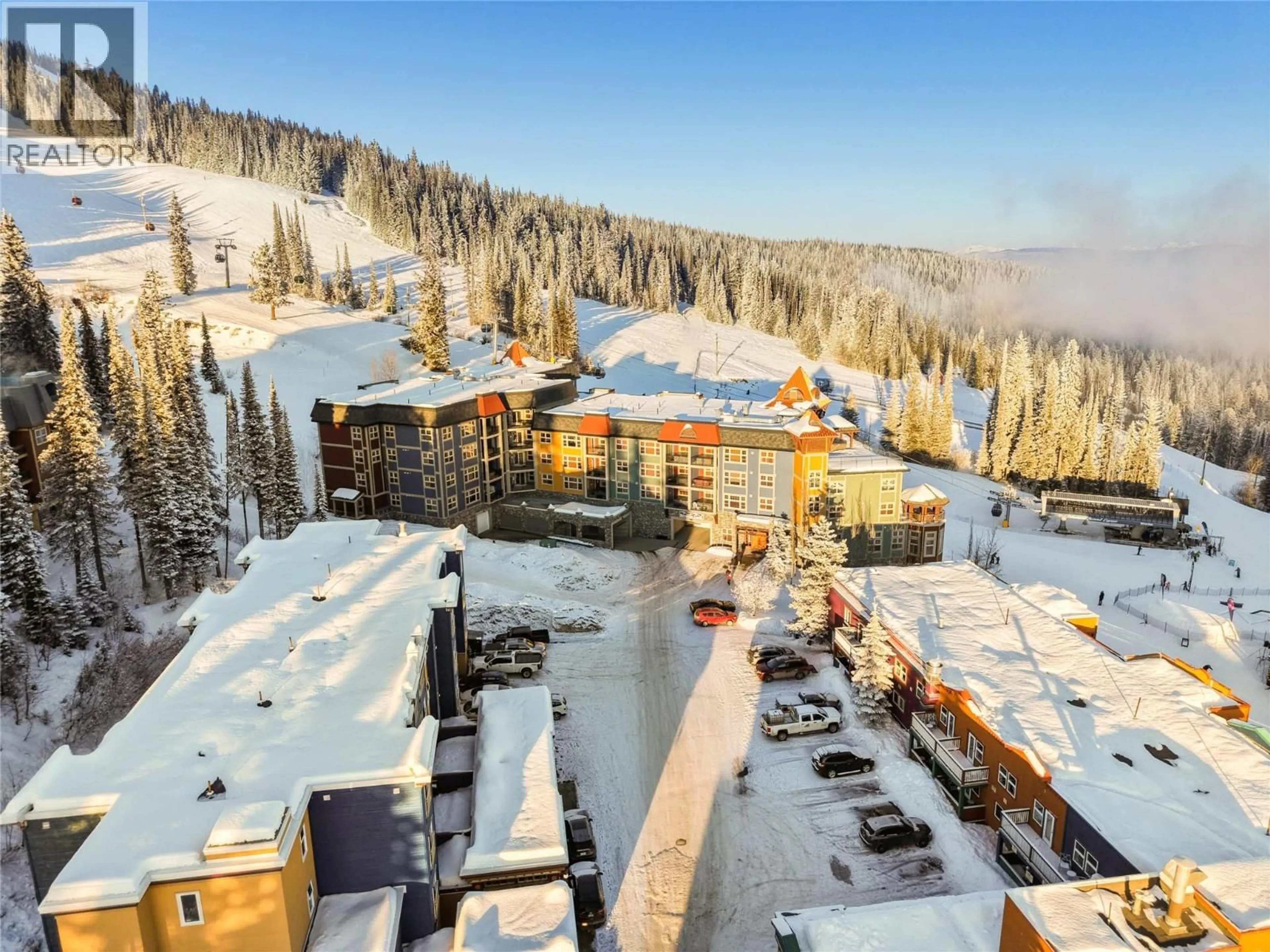 A pic from outside/outdoor area/front of a property/back of a property/a pic from drone, mountain view for 510 - 170 SILVER LODE LANE, Silver Star British Columbia V1B3M1