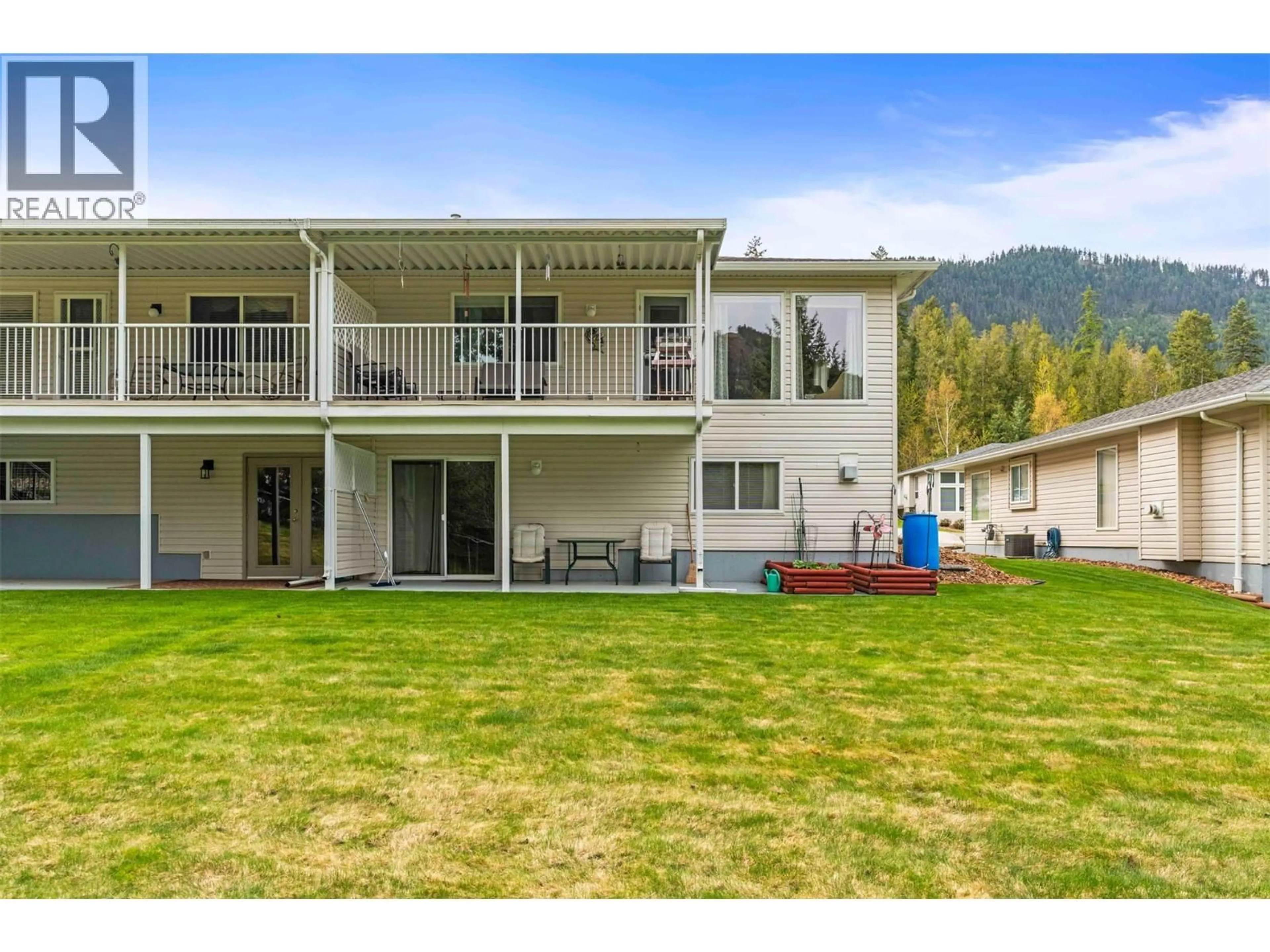 A pic from outside/outdoor area/front of a property/back of a property/a pic from drone, water/lake/river/ocean view for 54 - 2675 PINE AVENUE, Lumby British Columbia V0E2G5