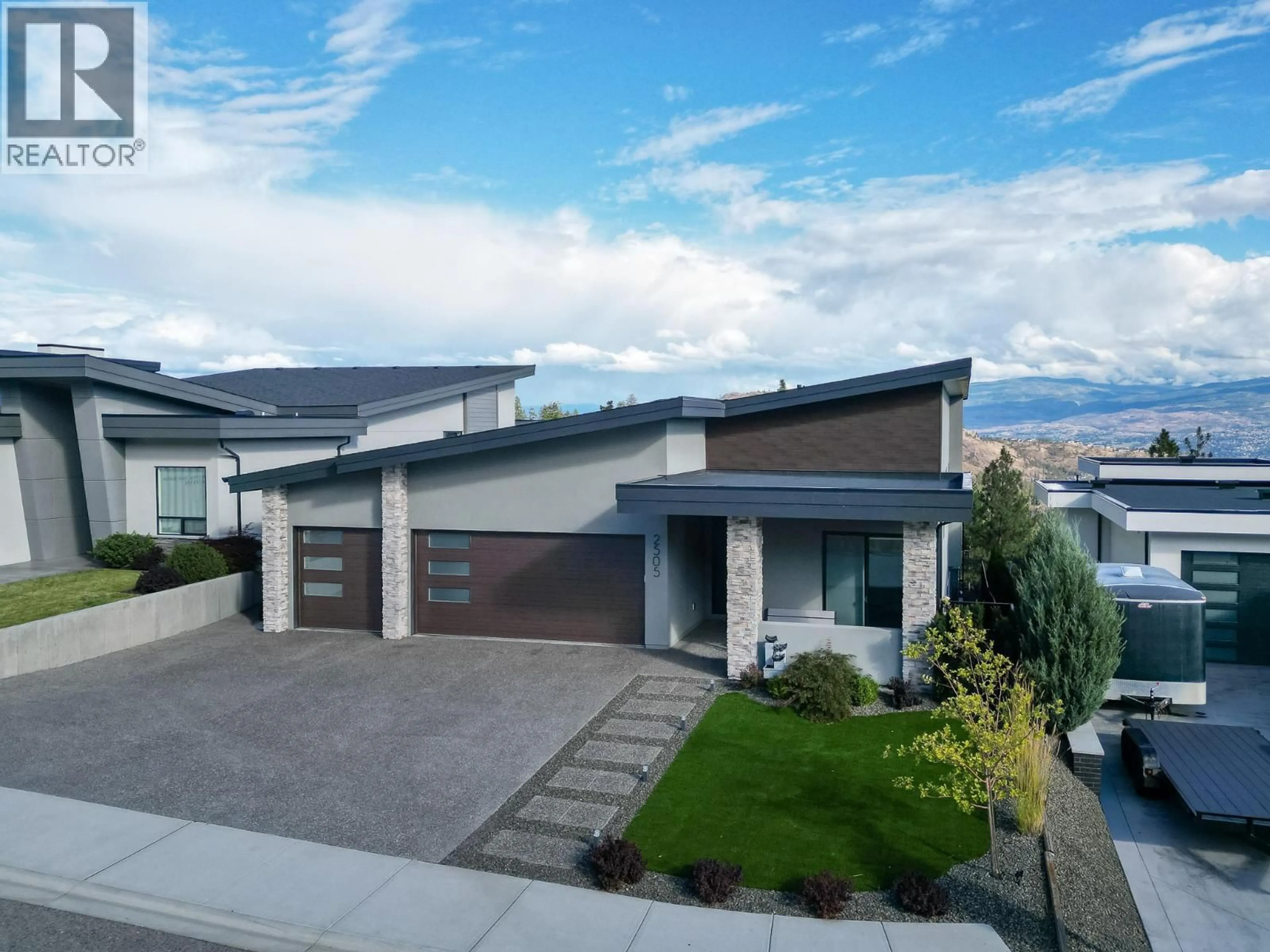 A pic from outside/outdoor area/front of a property/back of a property/a pic from drone, street for 2505 TALLUS HEIGHTS DRIVE, West Kelowna British Columbia V4T3M2