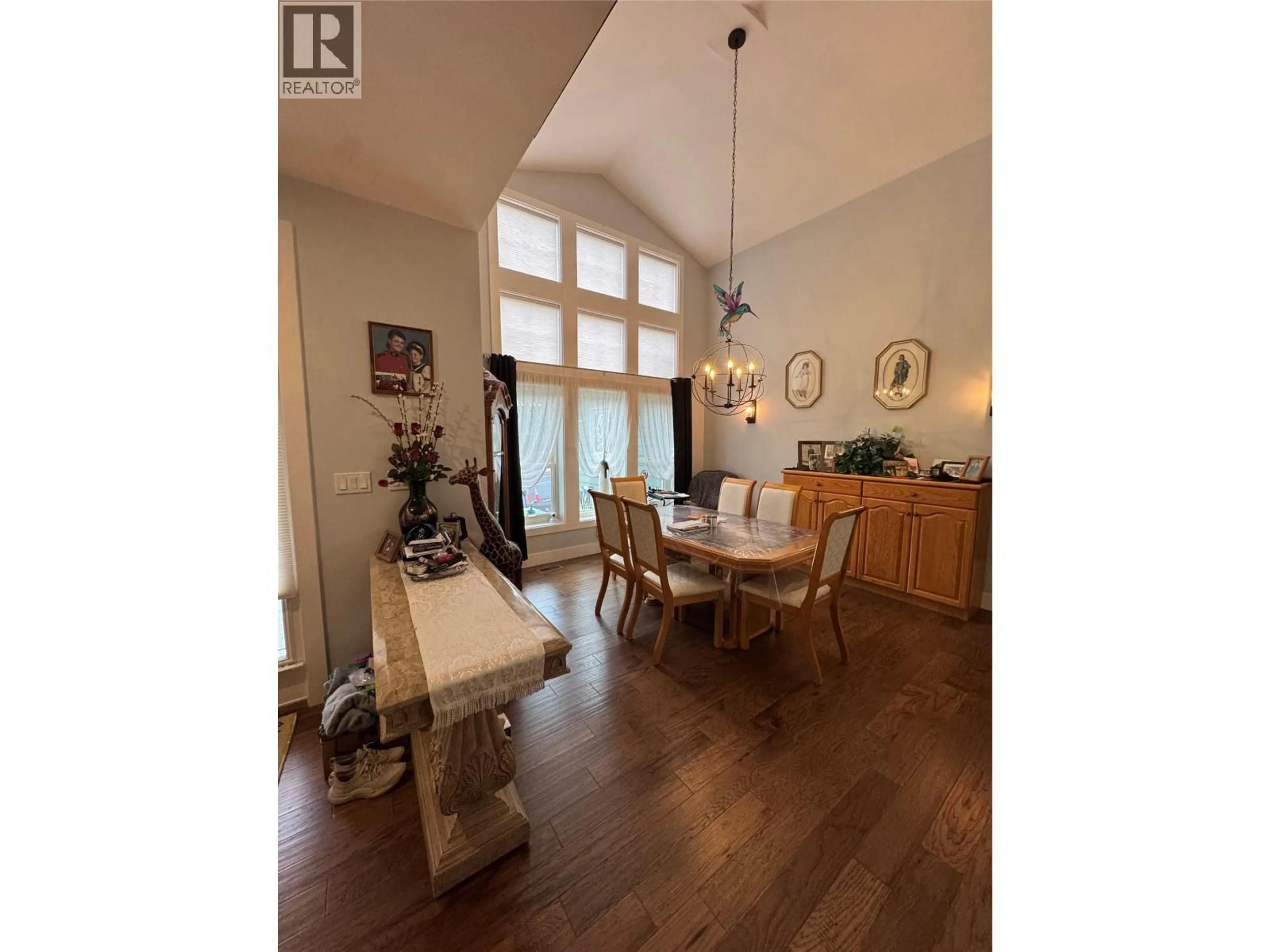 Dining room, wood/laminate floor for 2701 PEREGRINE WAY, Merritt British Columbia V1K0B4