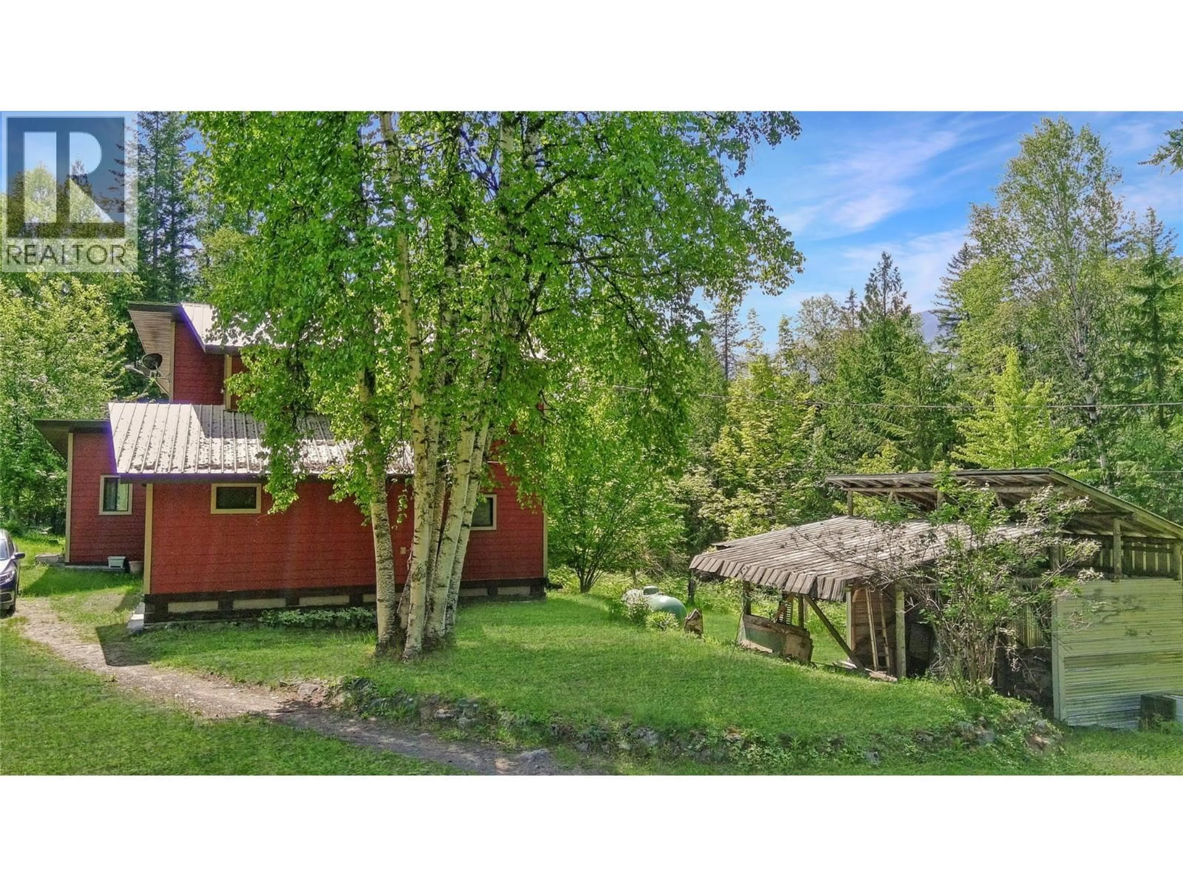 A pic from outside/outdoor area/front of a property/back of a property/a pic from drone, forest/trees view for 8802 MARTENS ROAD, Slocan British Columbia V0G2C0
