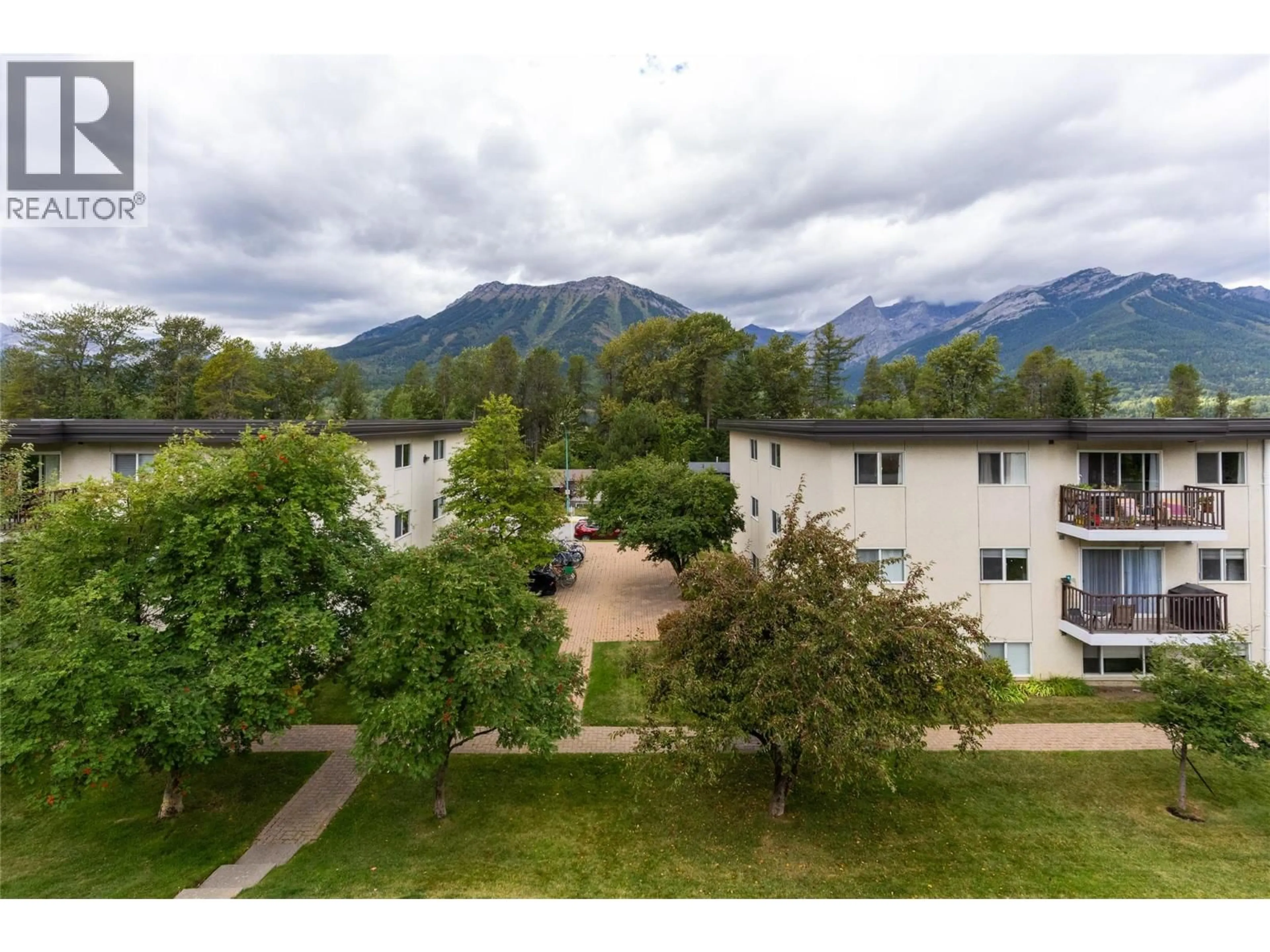 A pic from outside/outdoor area/front of a property/back of a property/a pic from drone, mountain view for 303 - 51 RIDGEMONT DRIVE, Fernie British Columbia V0B1M2