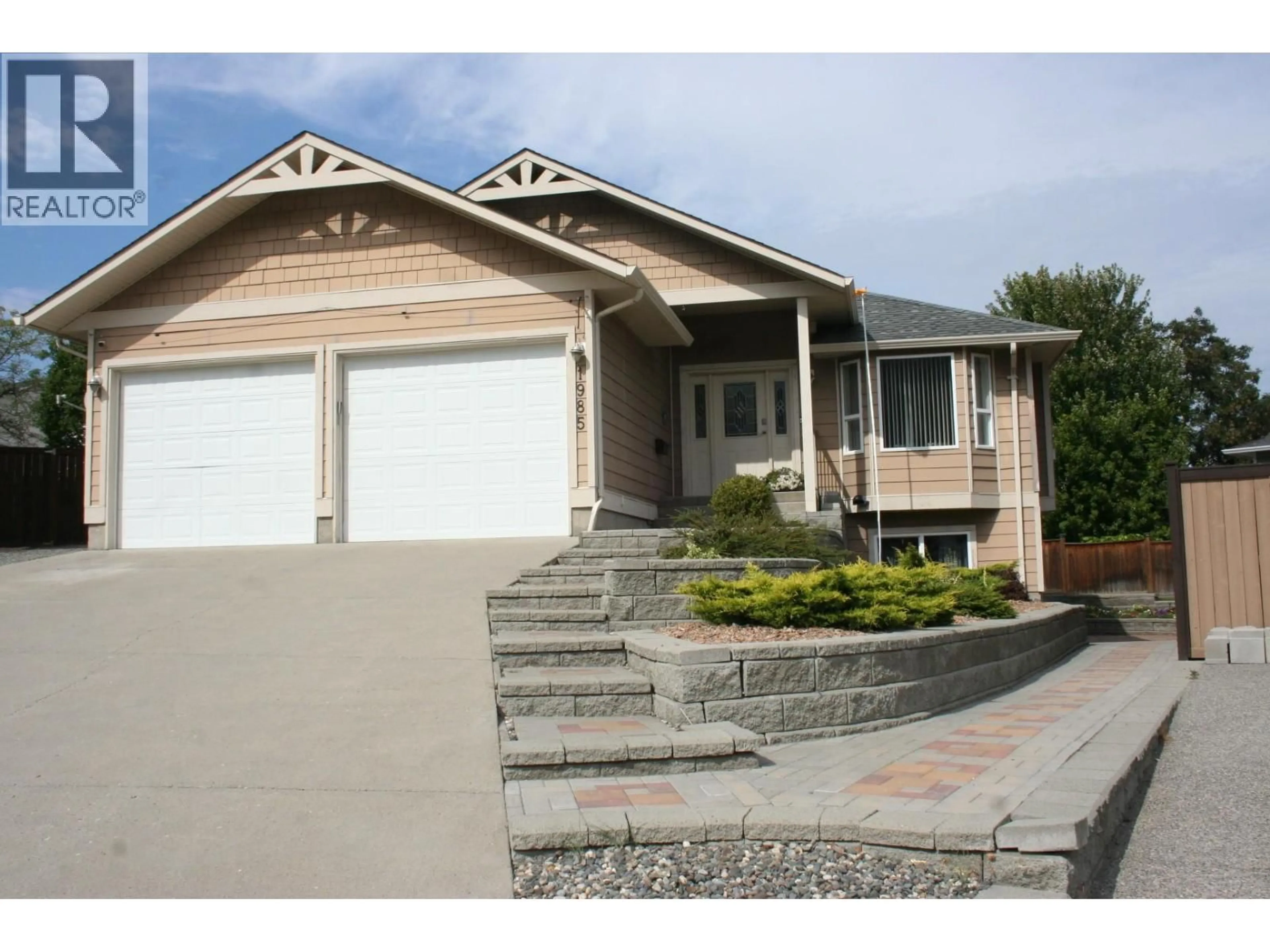 Home with vinyl exterior material, street for 1985 STIKINE PLACE, Kamloops British Columbia V2E2T2