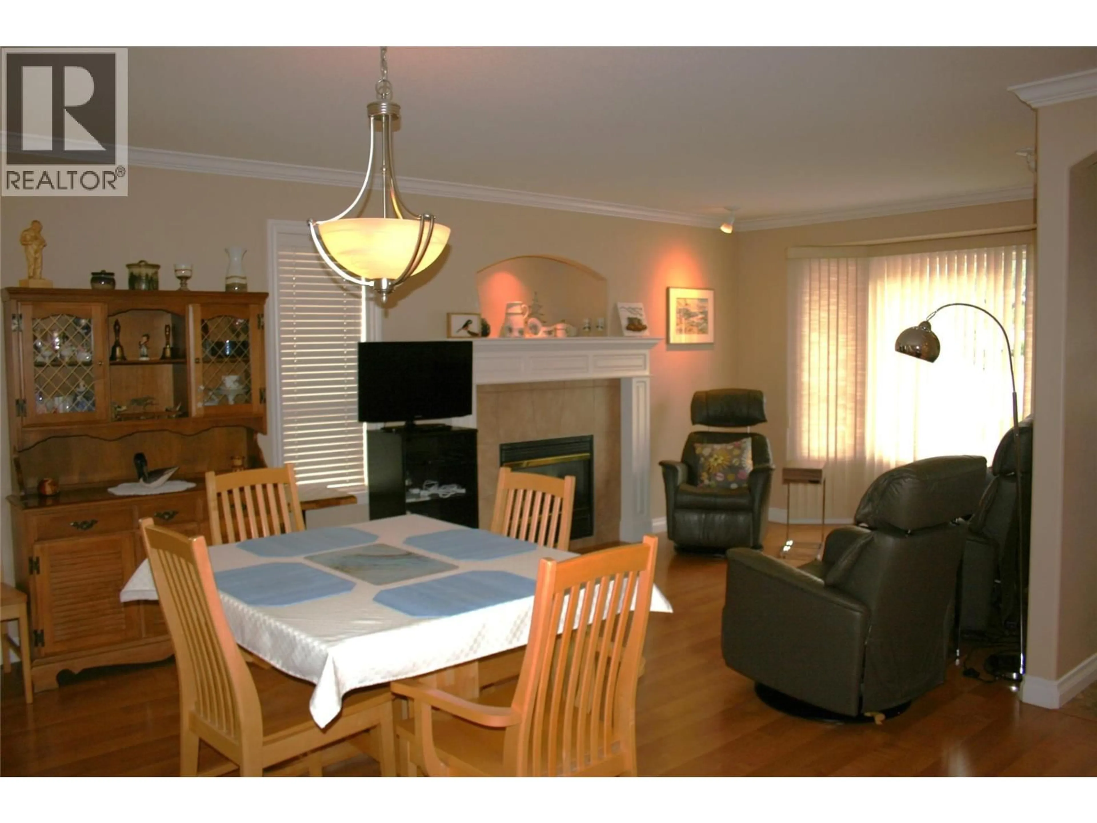 Living room with furniture, wood/laminate floor for 1985 STIKINE PLACE, Kamloops British Columbia V2E2T2