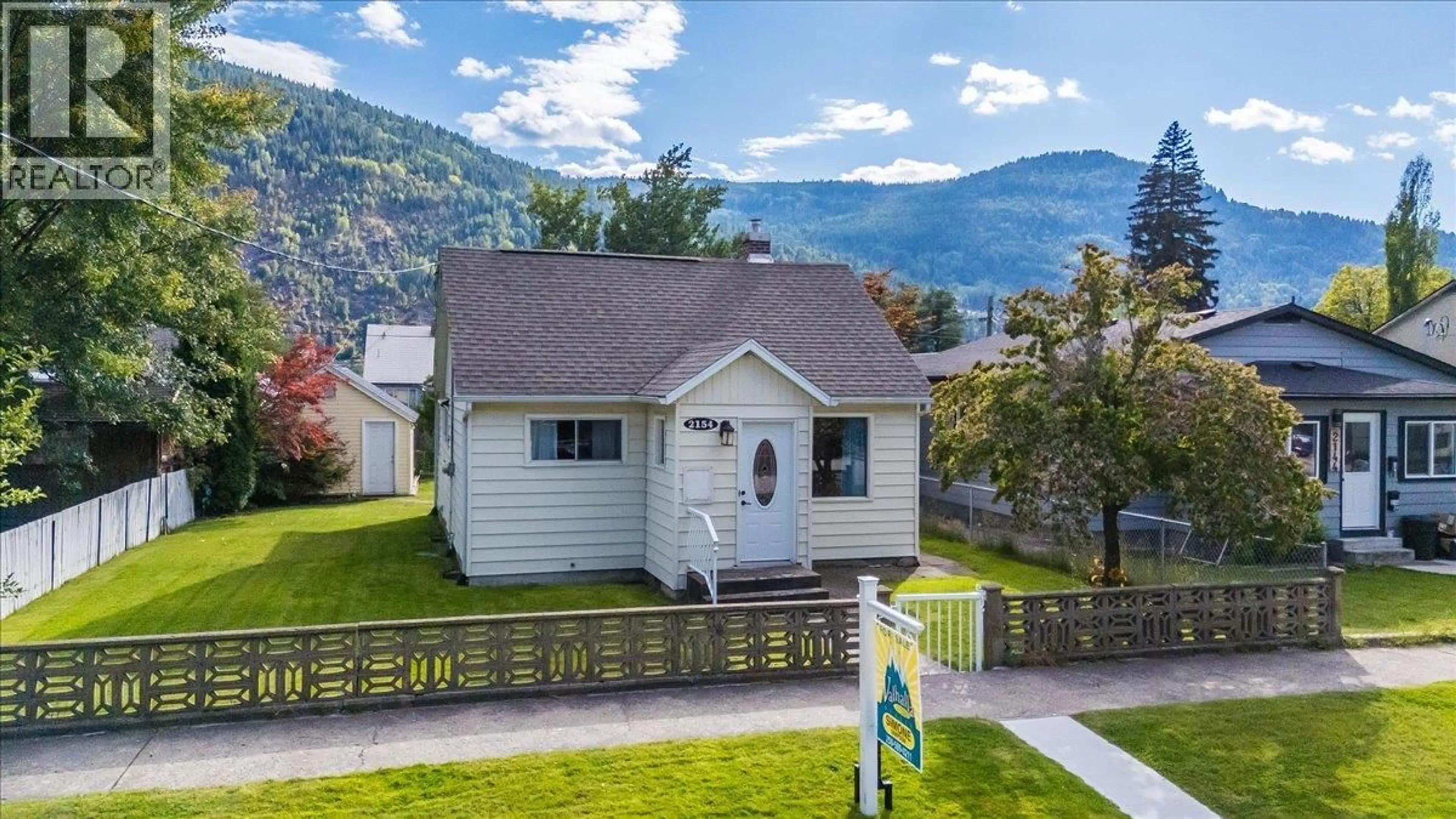A pic from outside/outdoor area/front of a property/back of a property/a pic from drone, water/lake/river/ocean view for 2154 SIXTH AVENUE, Trail British Columbia V1R3B7