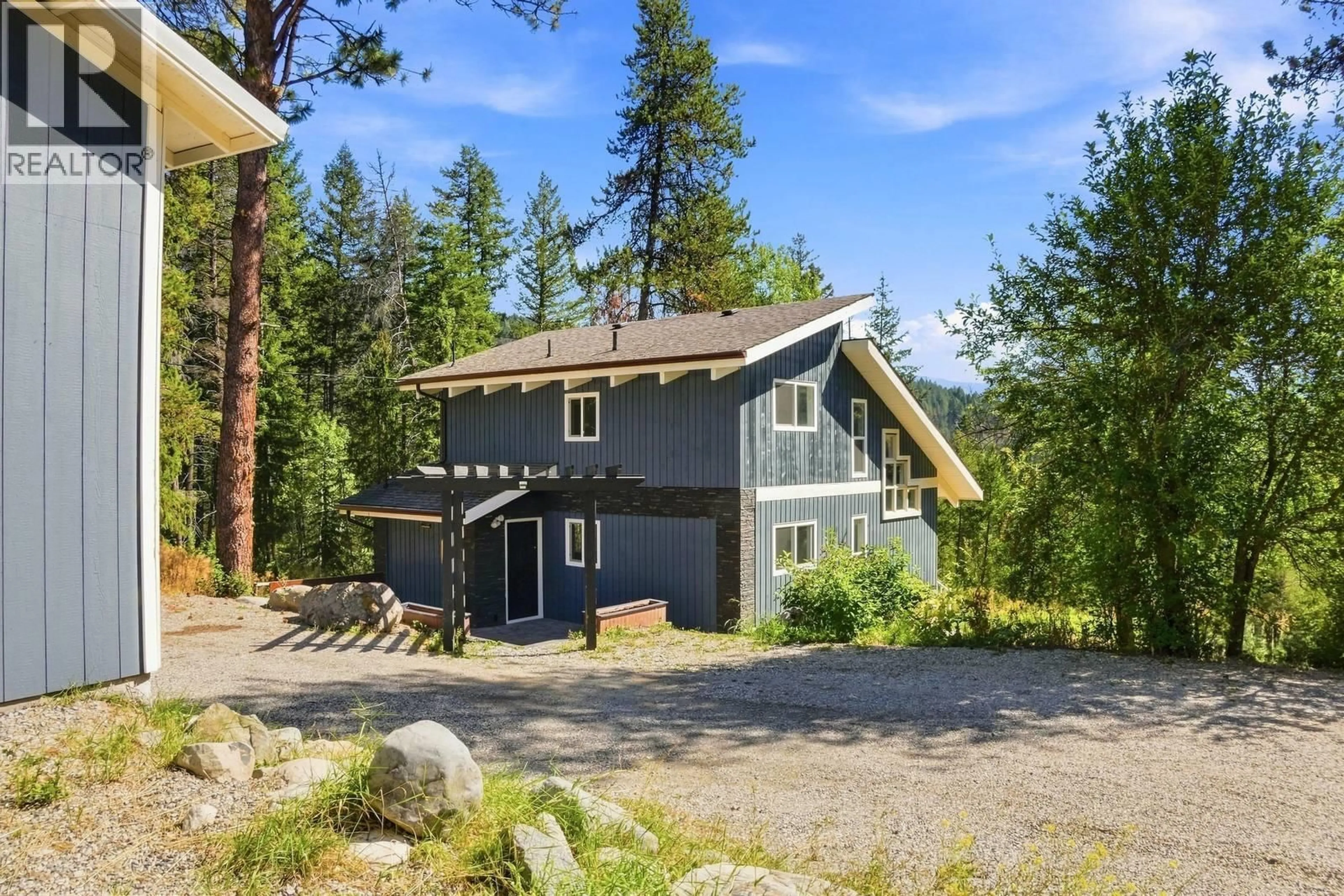 A pic from outside/outdoor area/front of a property/back of a property/a pic from drone, unknown for 321 PHILPOTT ROAD, Kelowna British Columbia V1P1J6