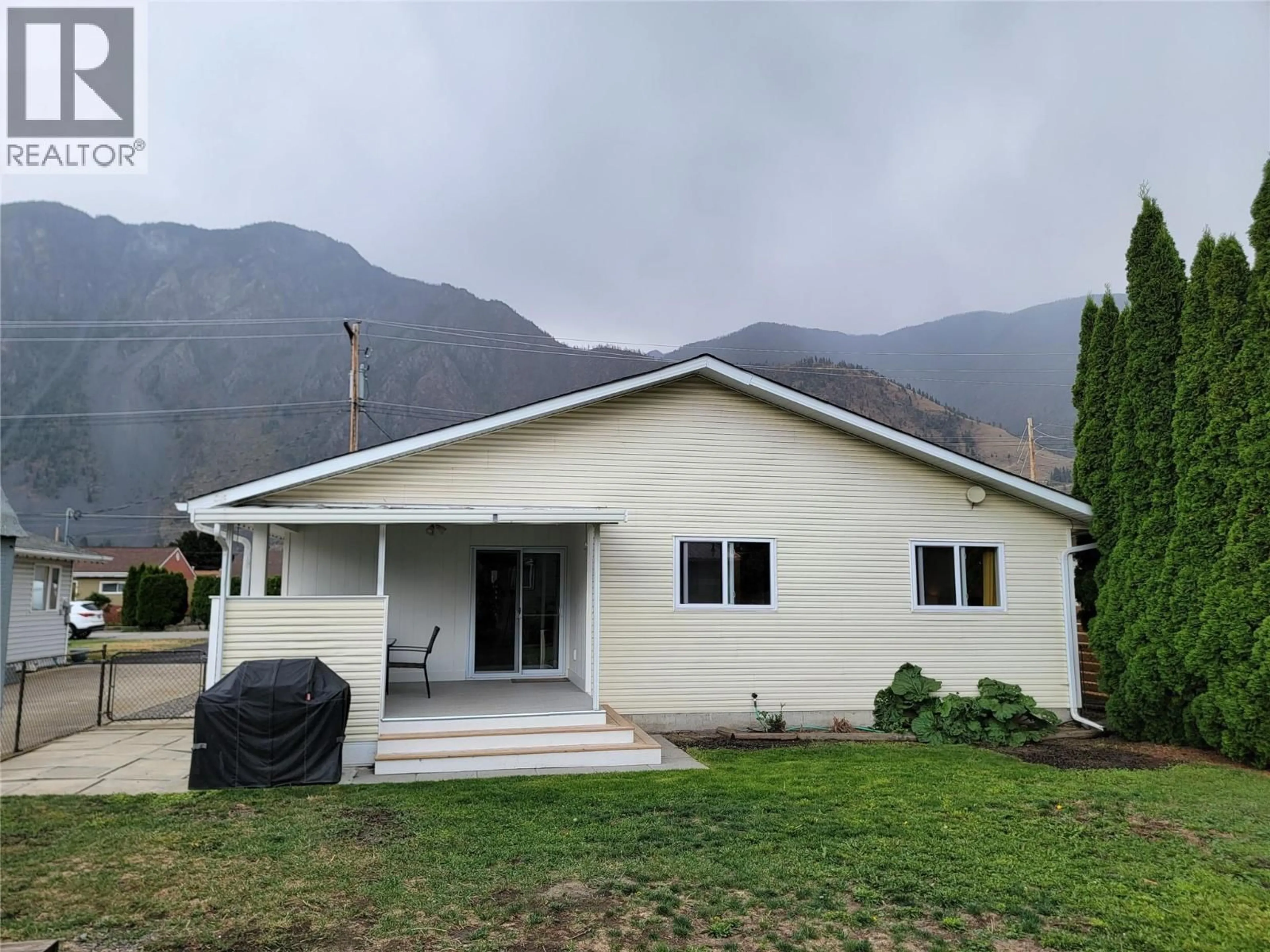 A pic from outside/outdoor area/front of a property/back of a property/a pic from drone, mountain view for 412 10TH AVENUE, Keremeos British Columbia V0X1N3