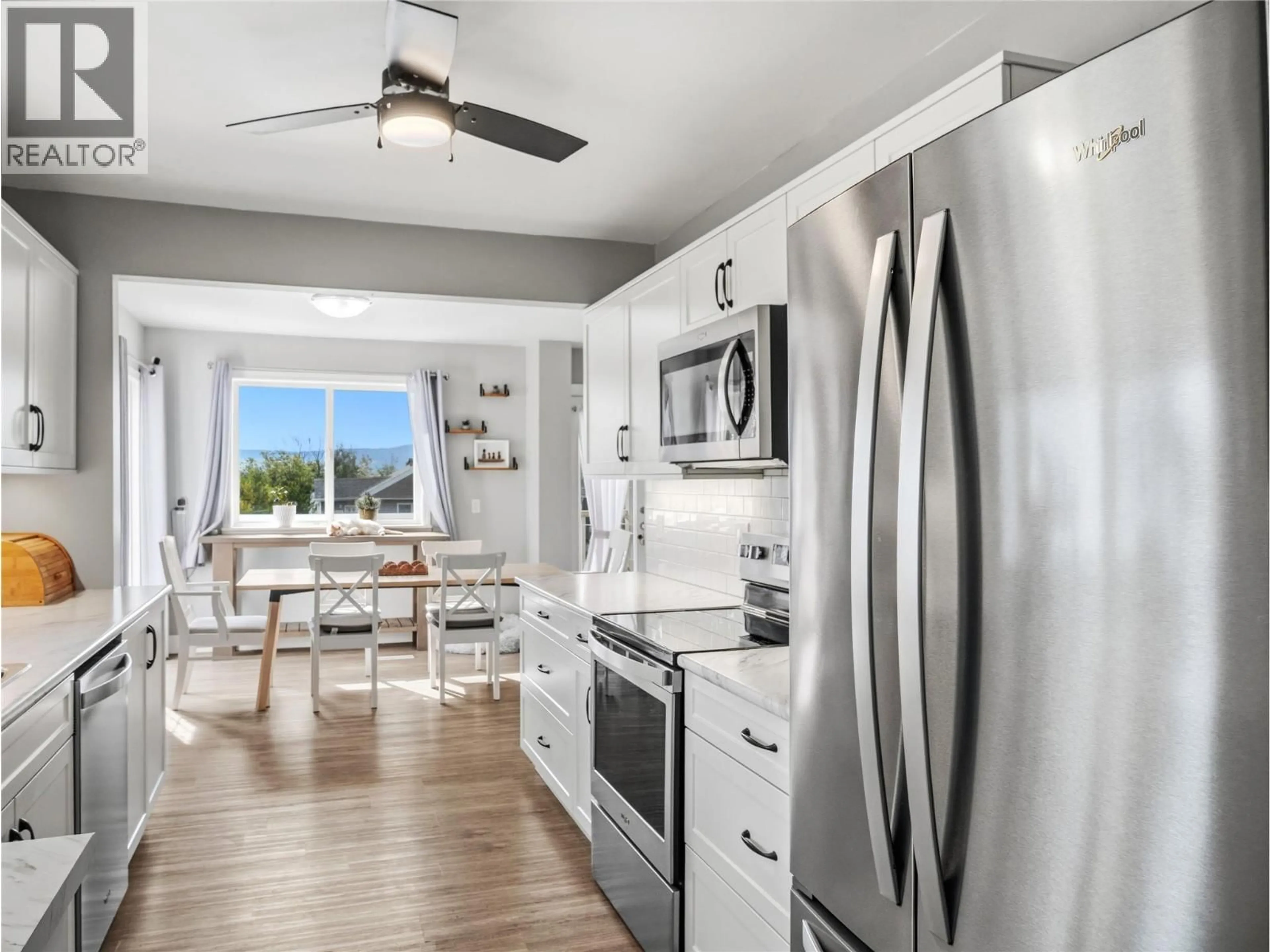 Open concept kitchen, unknown for 1400 96 AVENUE, Dawson Creek British Columbia V1G1L5