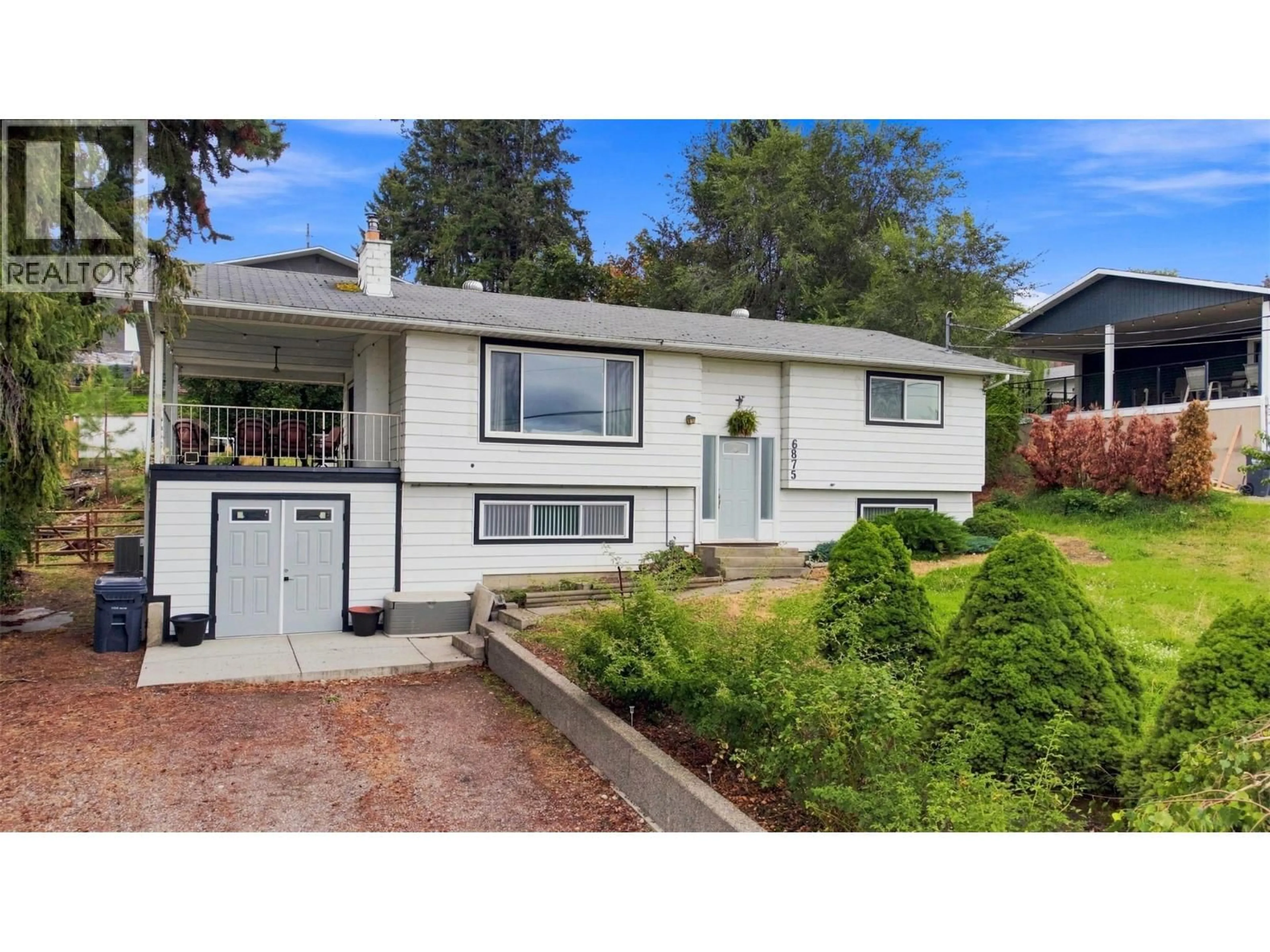 Home with vinyl exterior material, street for 6875 HERRY ROAD, Vernon British Columbia V1B3T4