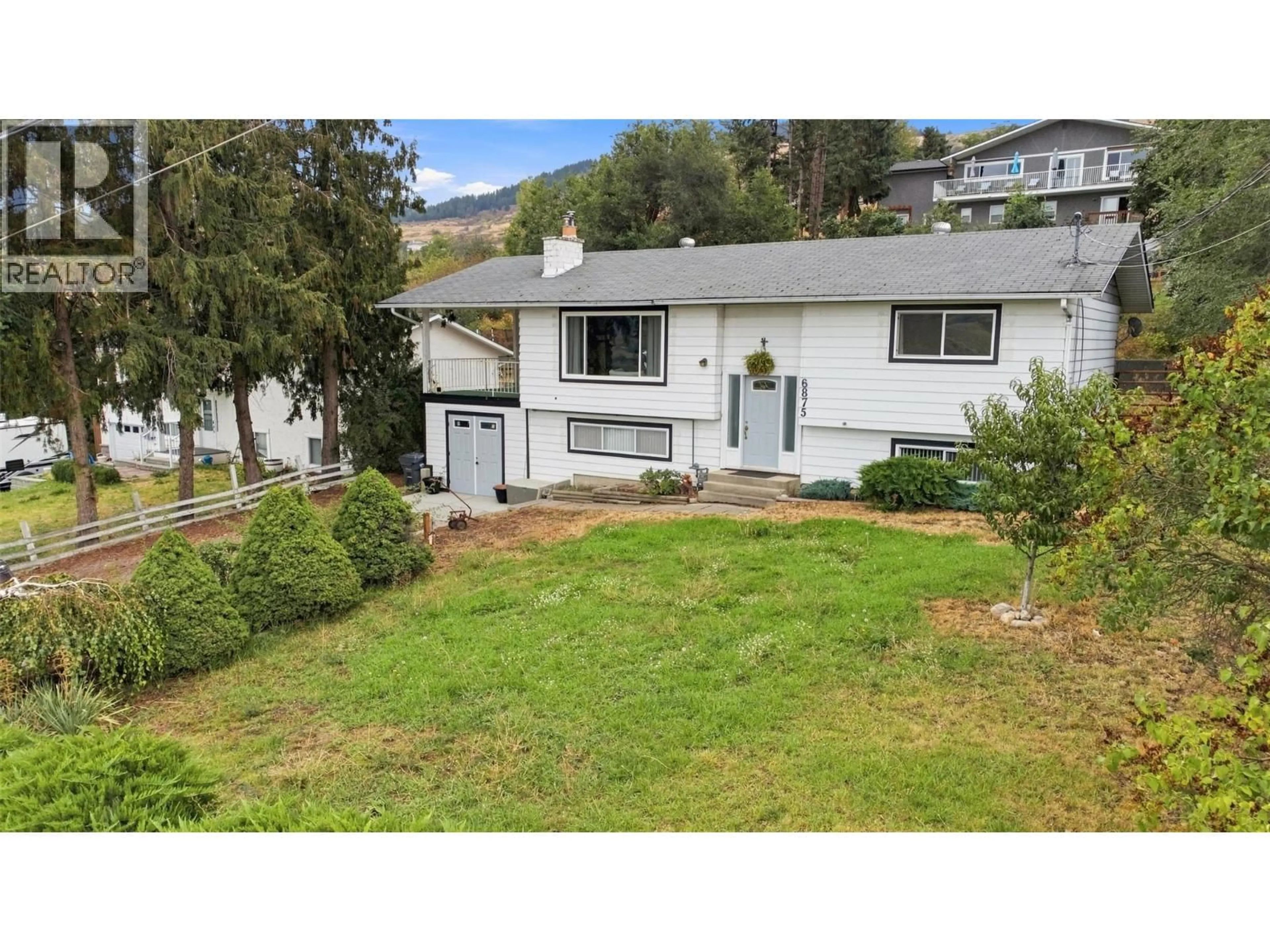A pic from outside/outdoor area/front of a property/back of a property/a pic from drone, mountain view for 6875 HERRY ROAD, Vernon British Columbia V1B3T4