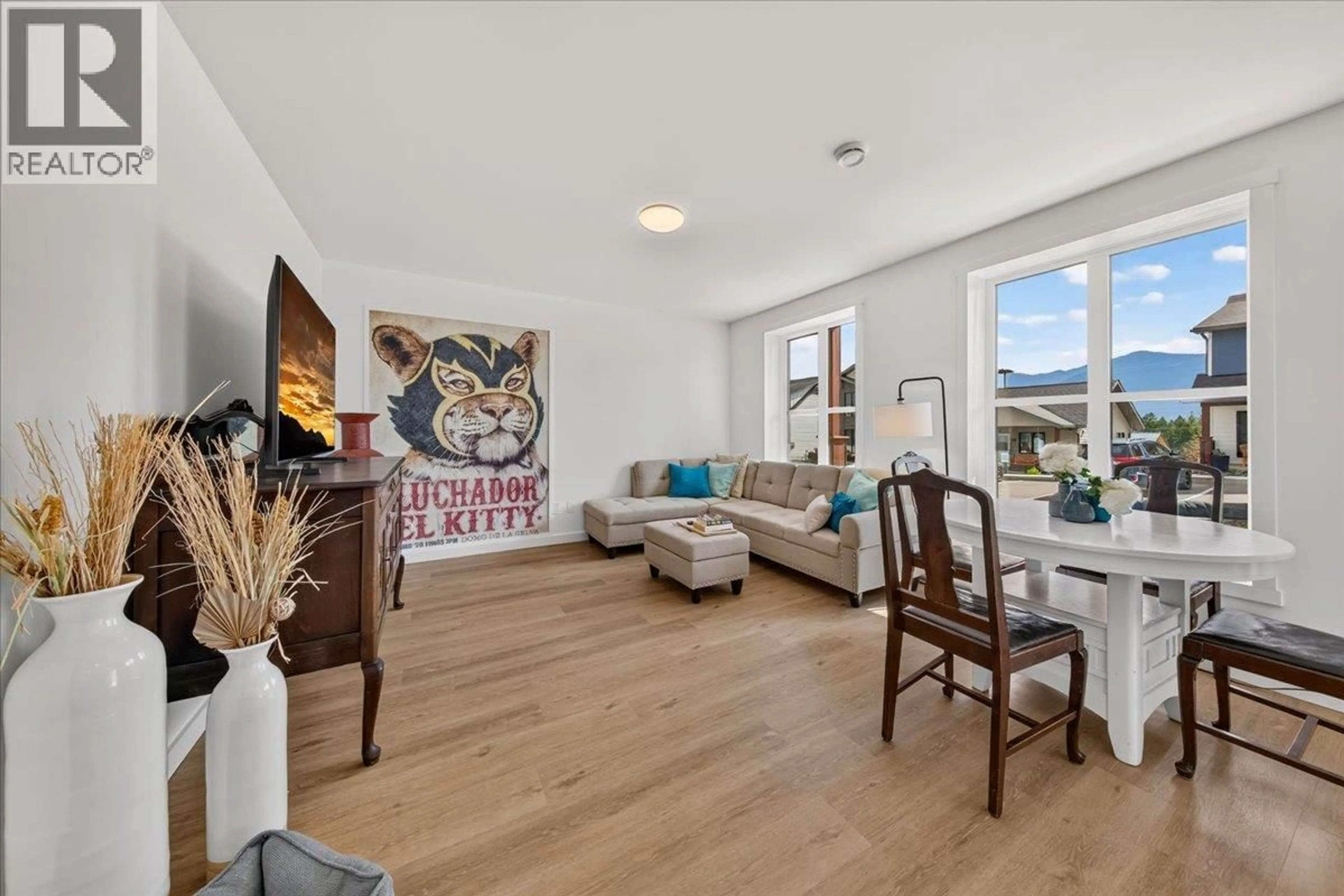 Living room with furniture, wood/laminate floor for 46 - 2098 PINE TREE WAY, Invermere British Columbia V0A1K4