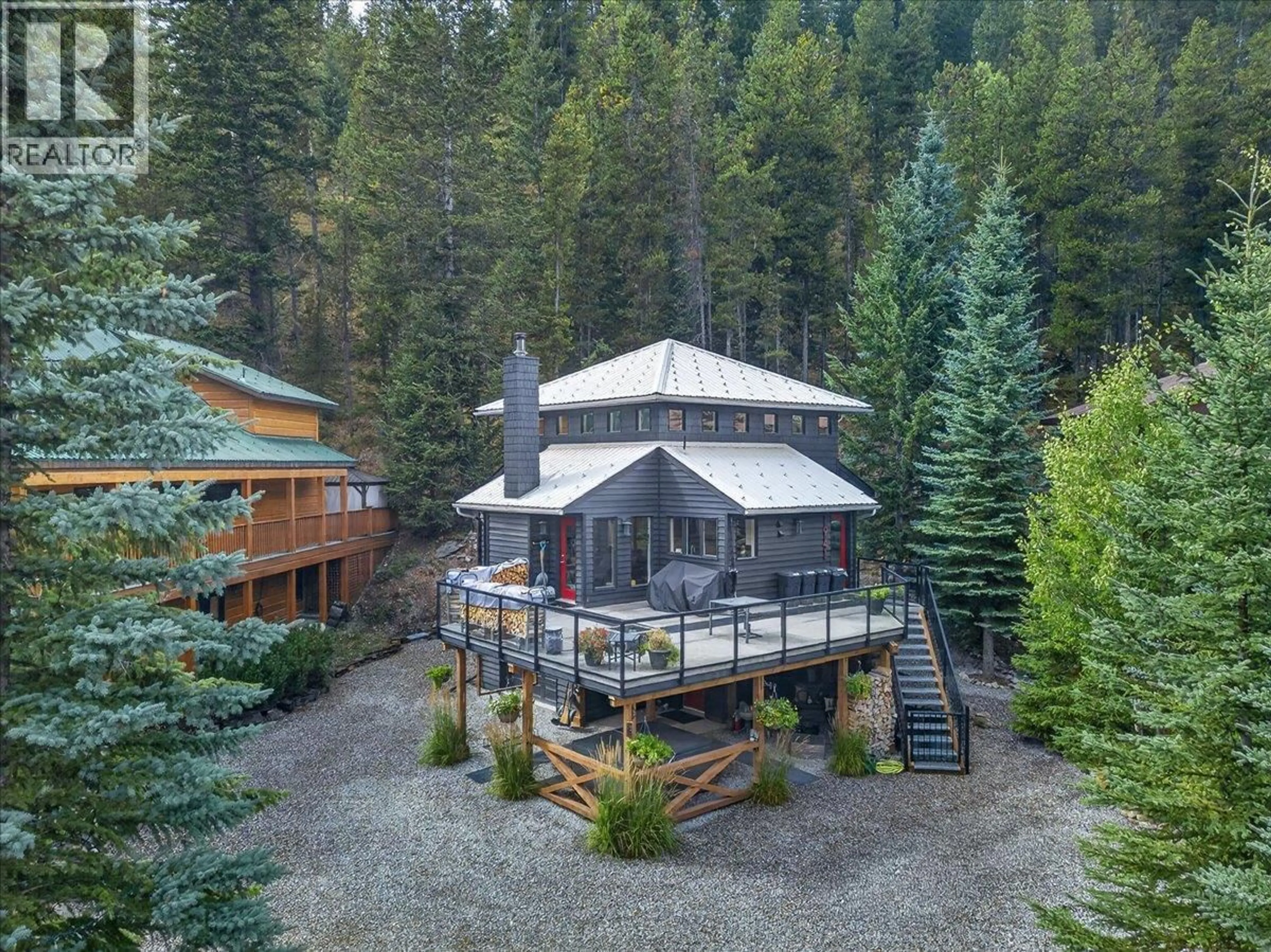 A pic from outside/outdoor area/front of a property/back of a property/a pic from drone, forest/trees view for 1941 GREYWOLF DRIVE, Panorama British Columbia V0A1T0