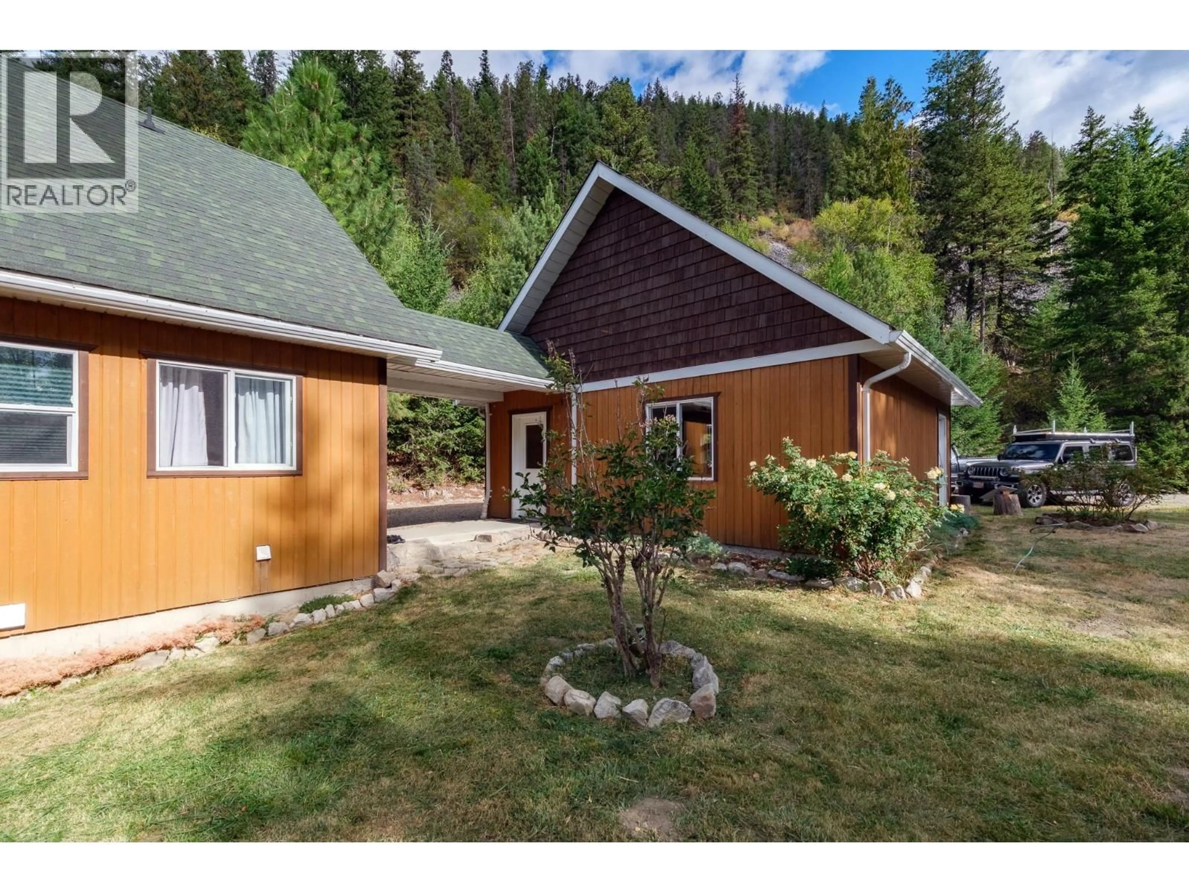 A pic from outside/outdoor area/front of a property/back of a property/a pic from drone, unknown for 1249 CREIGHTON VALLEY ROAD, Lumby British Columbia V0E2G1