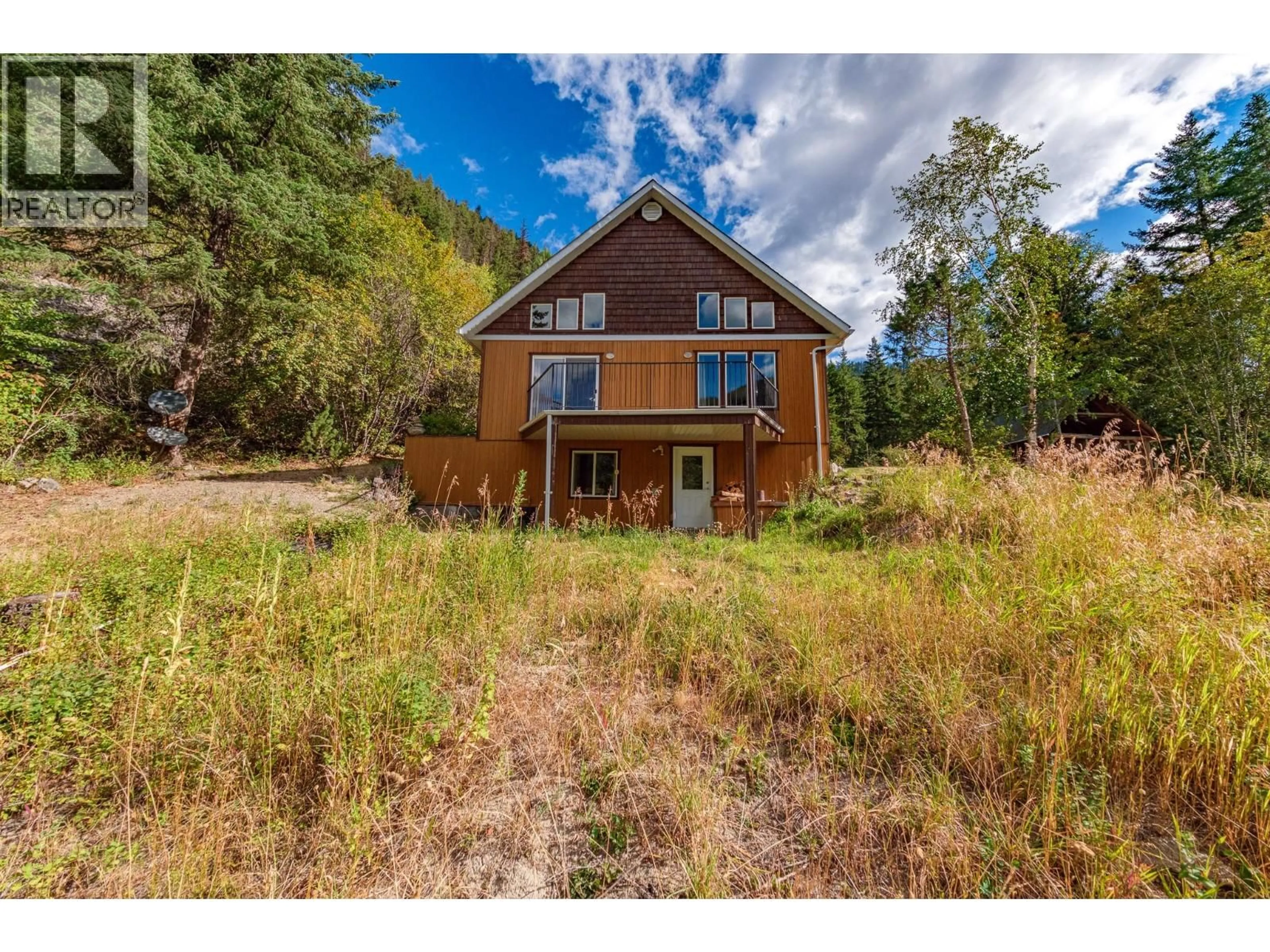 A pic from outside/outdoor area/front of a property/back of a property/a pic from drone, unknown for 1249 CREIGHTON VALLEY ROAD, Lumby British Columbia V0E2G1