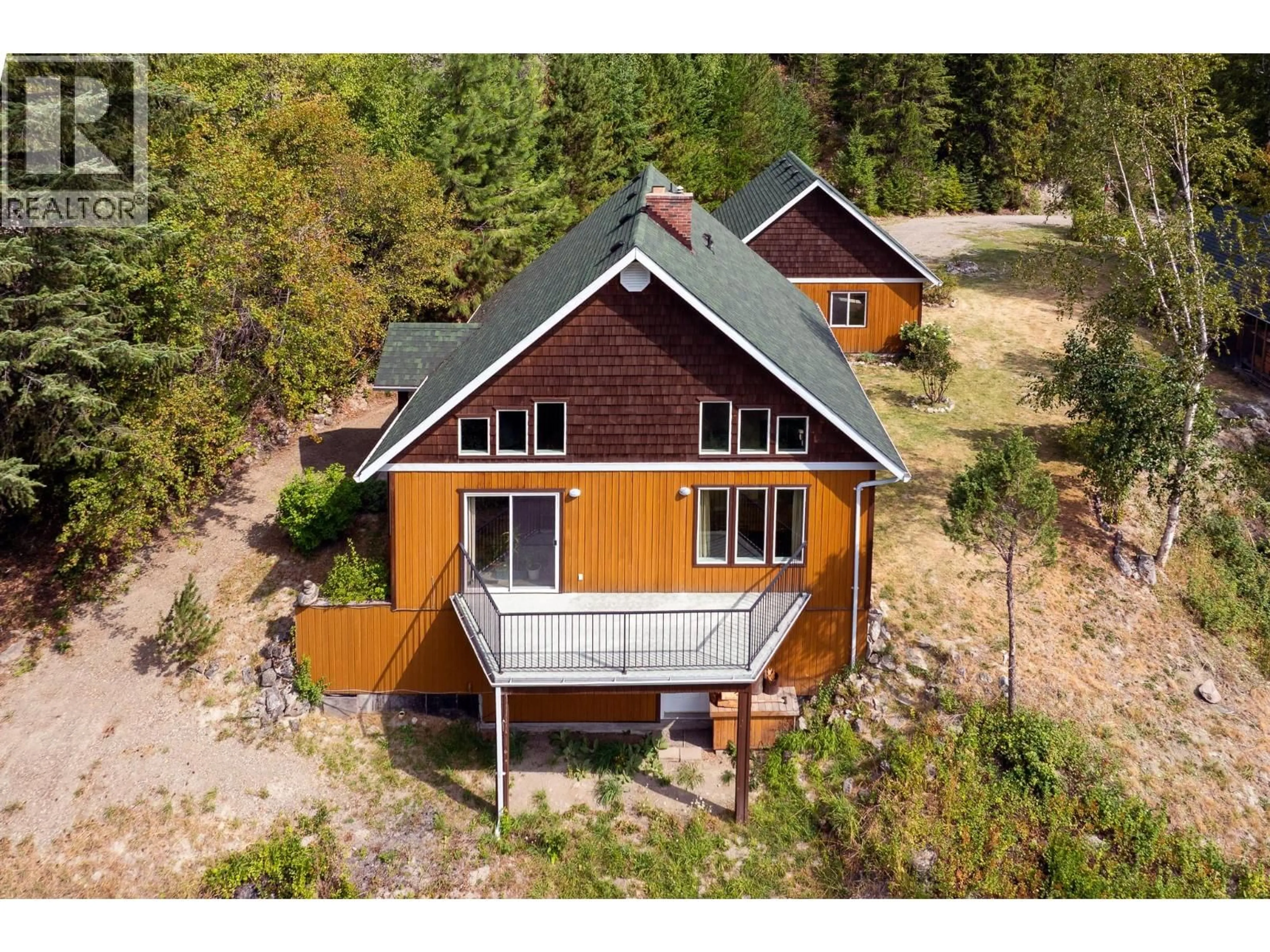 A pic from outside/outdoor area/front of a property/back of a property/a pic from drone, unknown for 1249 CREIGHTON VALLEY ROAD, Lumby British Columbia V0E2G1