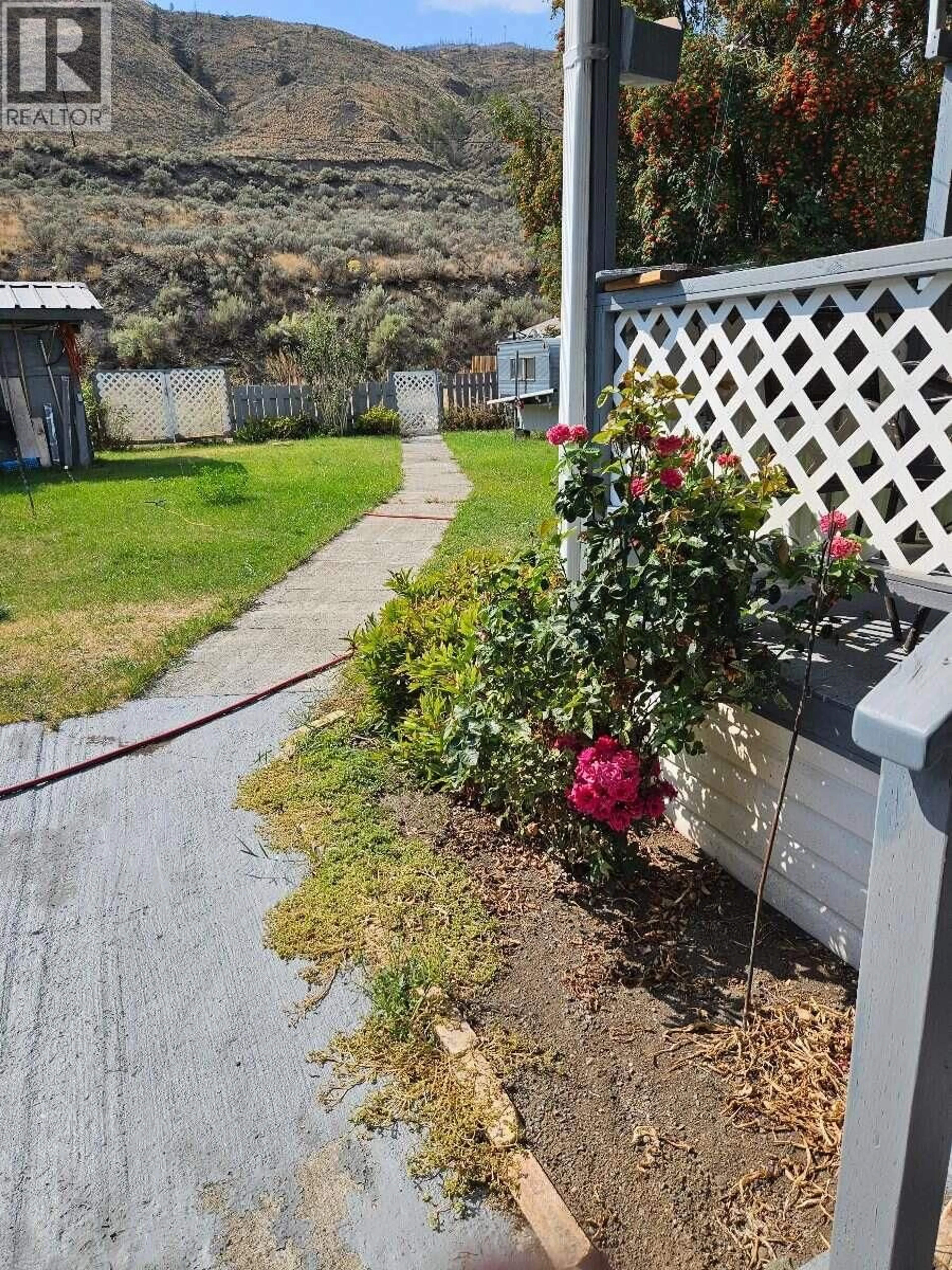 A pic from outside/outdoor area/front of a property/back of a property/a pic from drone, street for 85 - 701 TRANS CANADA HIGHWAY, Cache Creek British Columbia V0K1H0