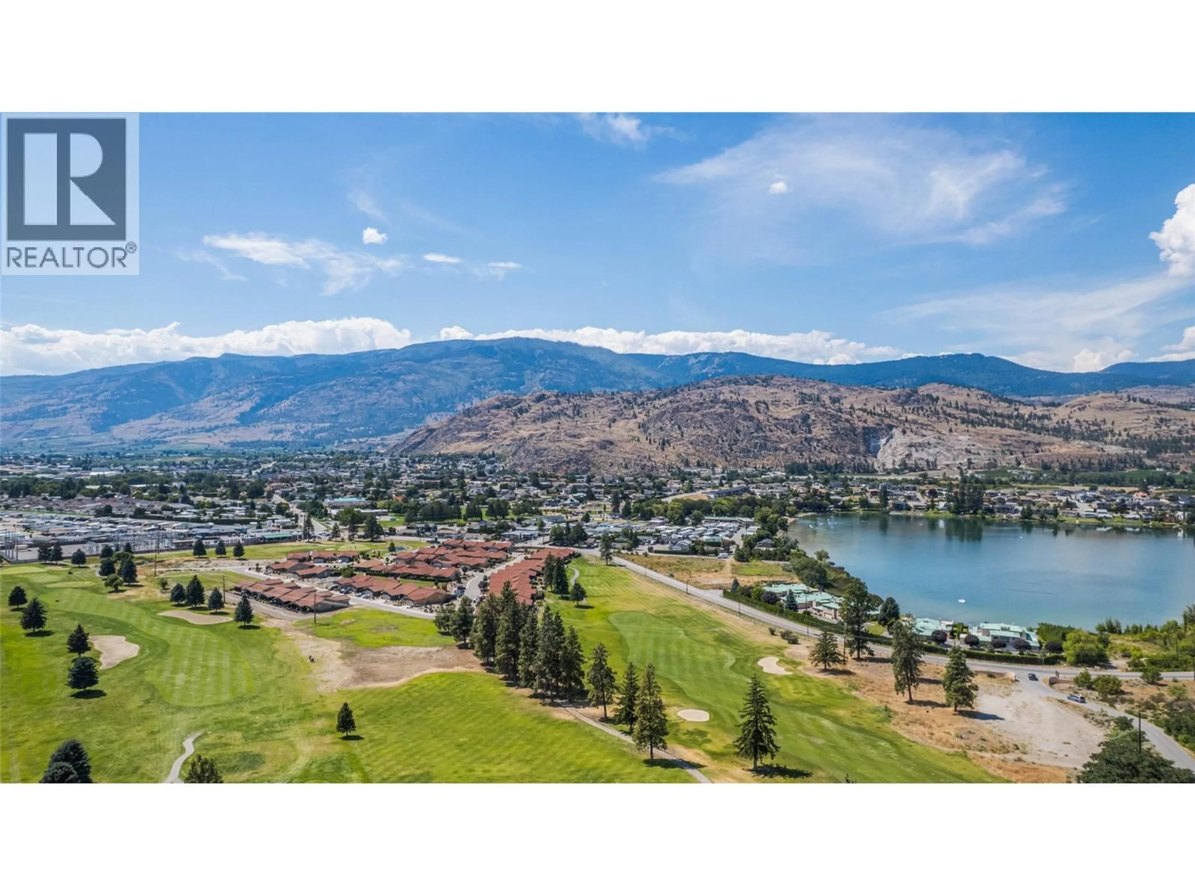 A pic from outside/outdoor area/front of a property/back of a property/a pic from drone, water/lake/river/ocean view for 5 - 6823 TUCELNUIT DRIVE, Oliver British Columbia V0H1T2