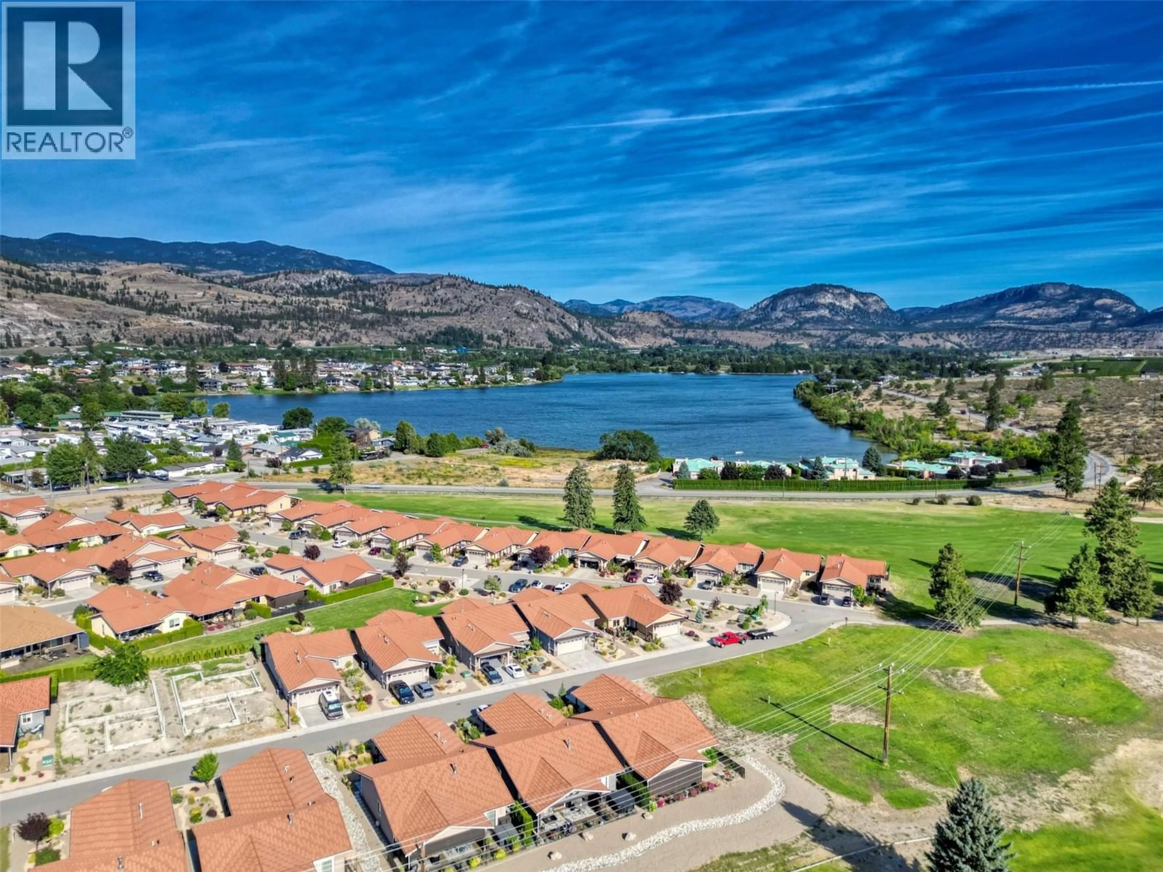A pic from outside/outdoor area/front of a property/back of a property/a pic from drone, water/lake/river/ocean view for 5 - 6823 TUCELNUIT DRIVE, Oliver British Columbia V0H1T2