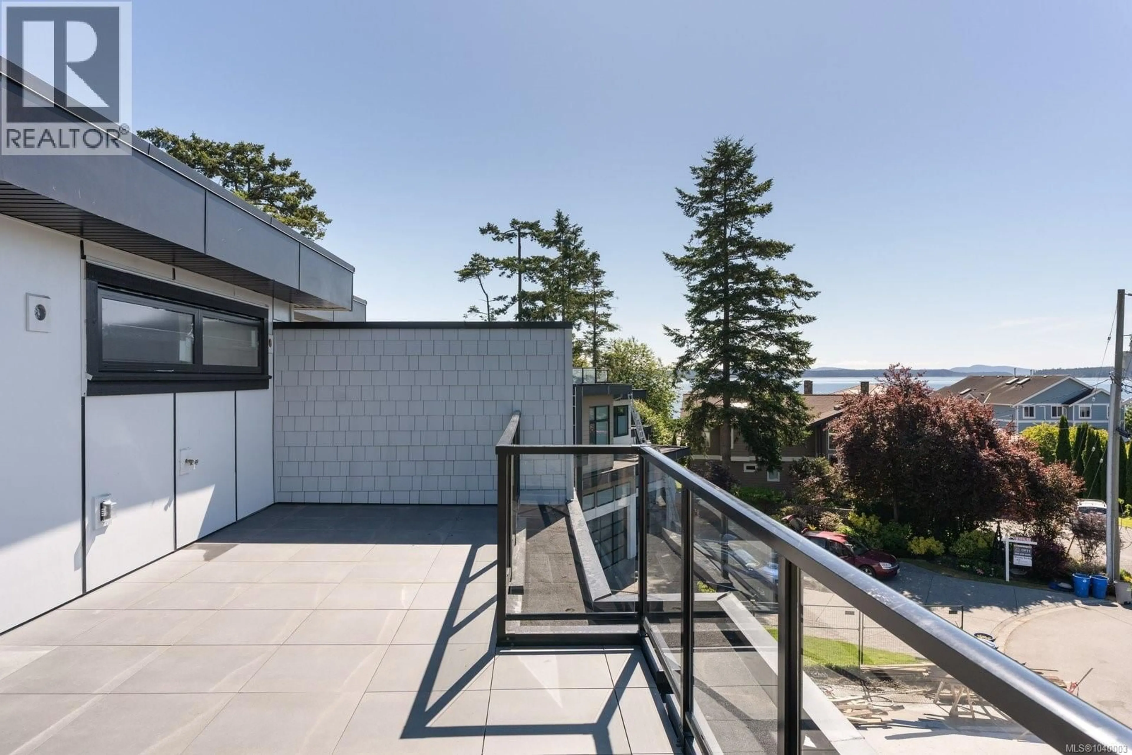 Patio, city buildings view from balcony for 2292 GAIL PLACE, Sidney British Columbia V8L2S2