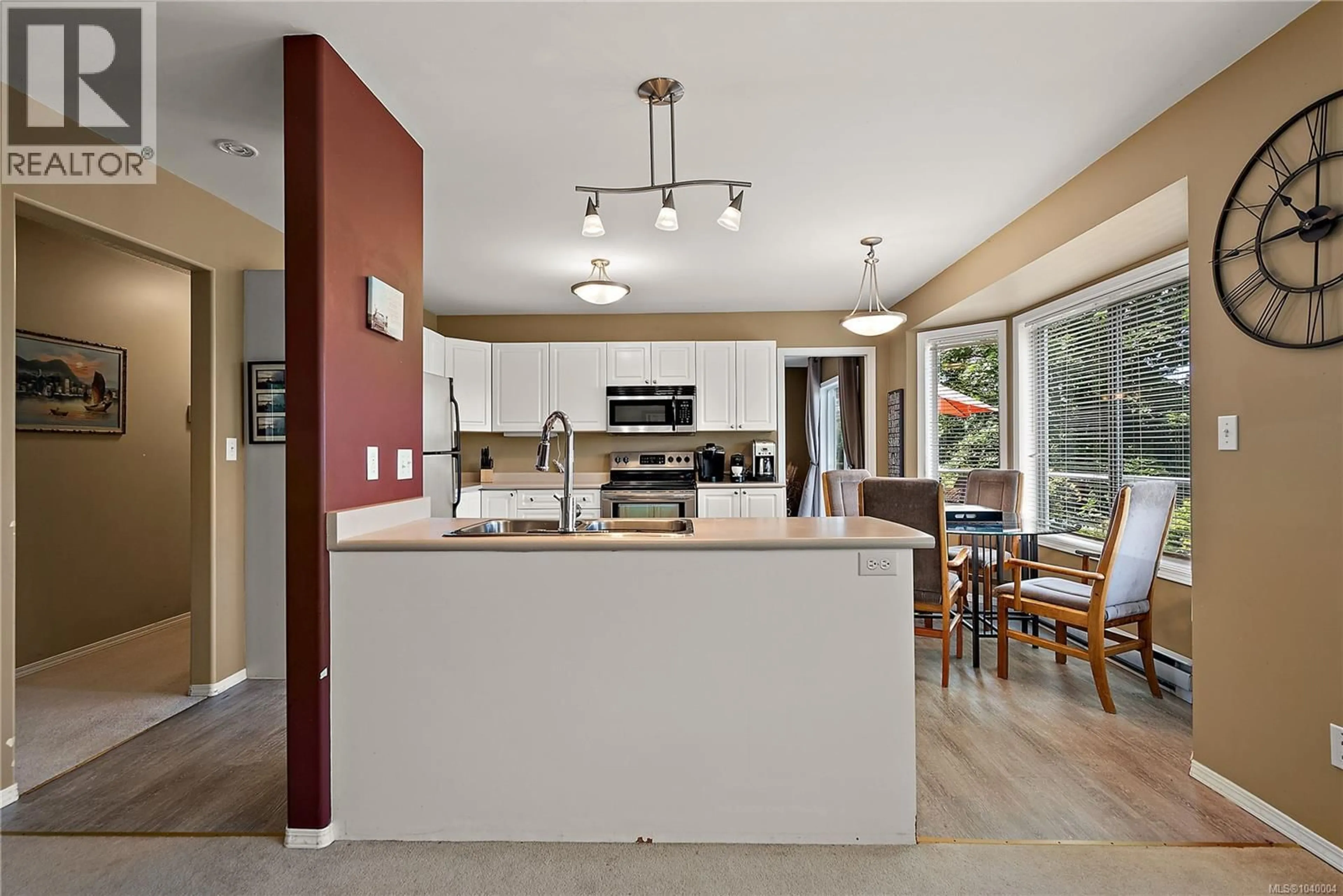 Open concept kitchen, ceramic/tile floor for A - 6599 CENTRAL SAANICH ROAD, Central Saanich British Columbia V8Z5V1