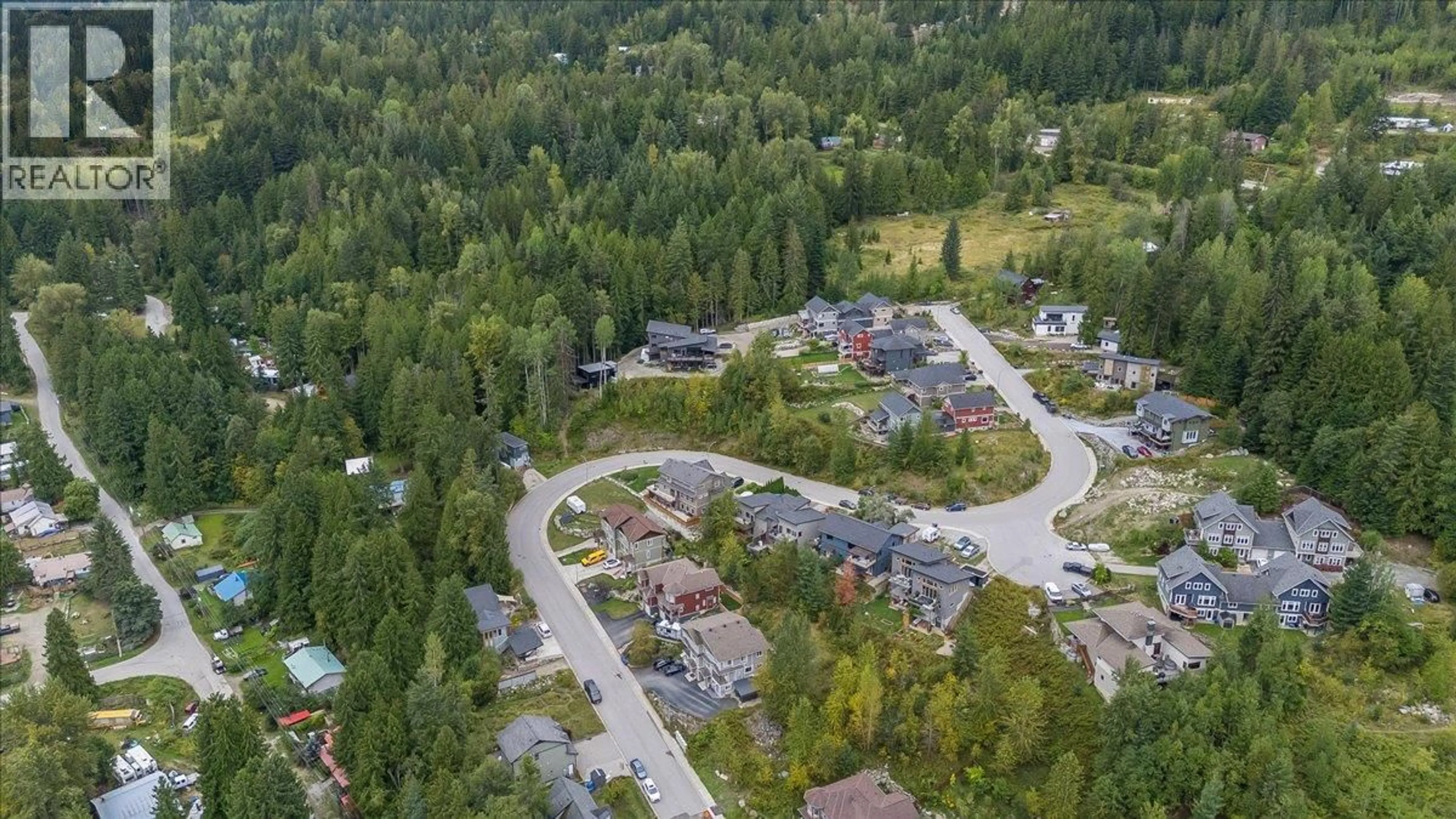 A pic from outside/outdoor area/front of a property/back of a property/a pic from drone, street for A - 2410 PERRIER LANE, Nelson British Columbia V1L7C3
