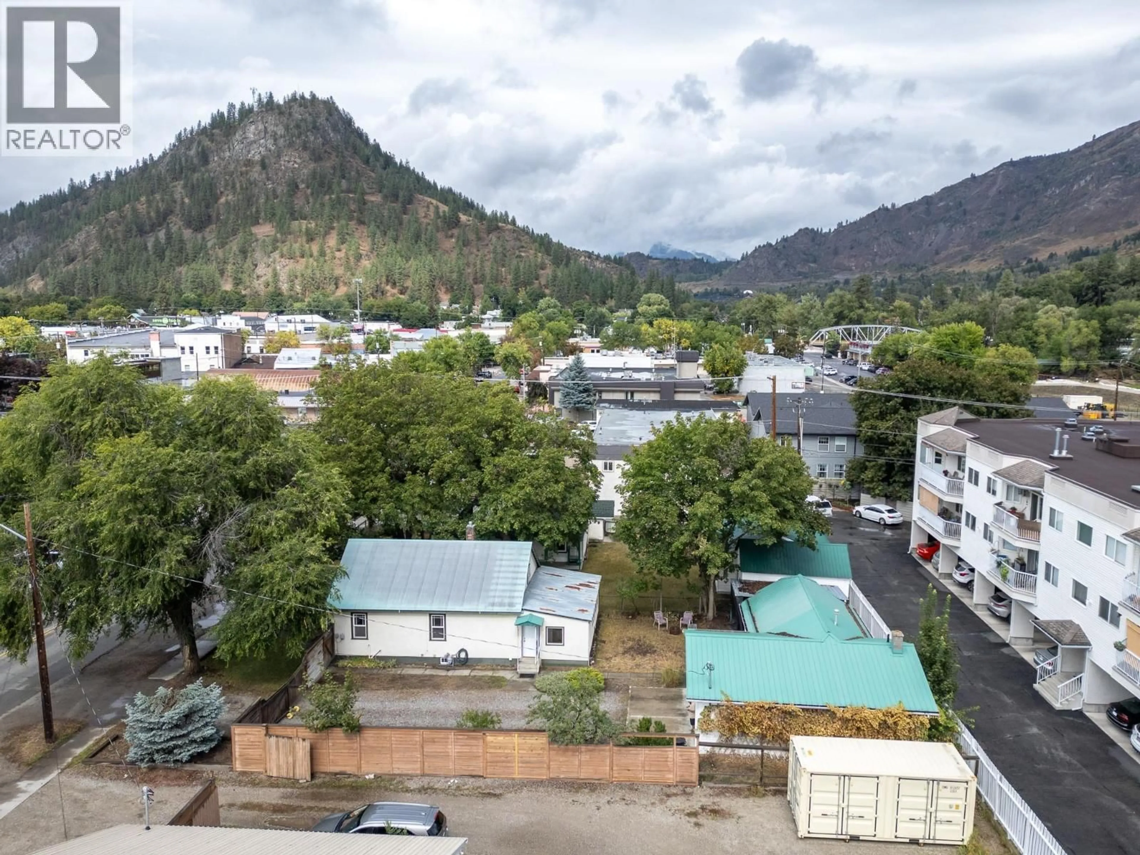 A pic from outside/outdoor area/front of a property/back of a property/a pic from drone, mountain view for 7134 2ND STREET, Grand Forks British Columbia V0H1H0