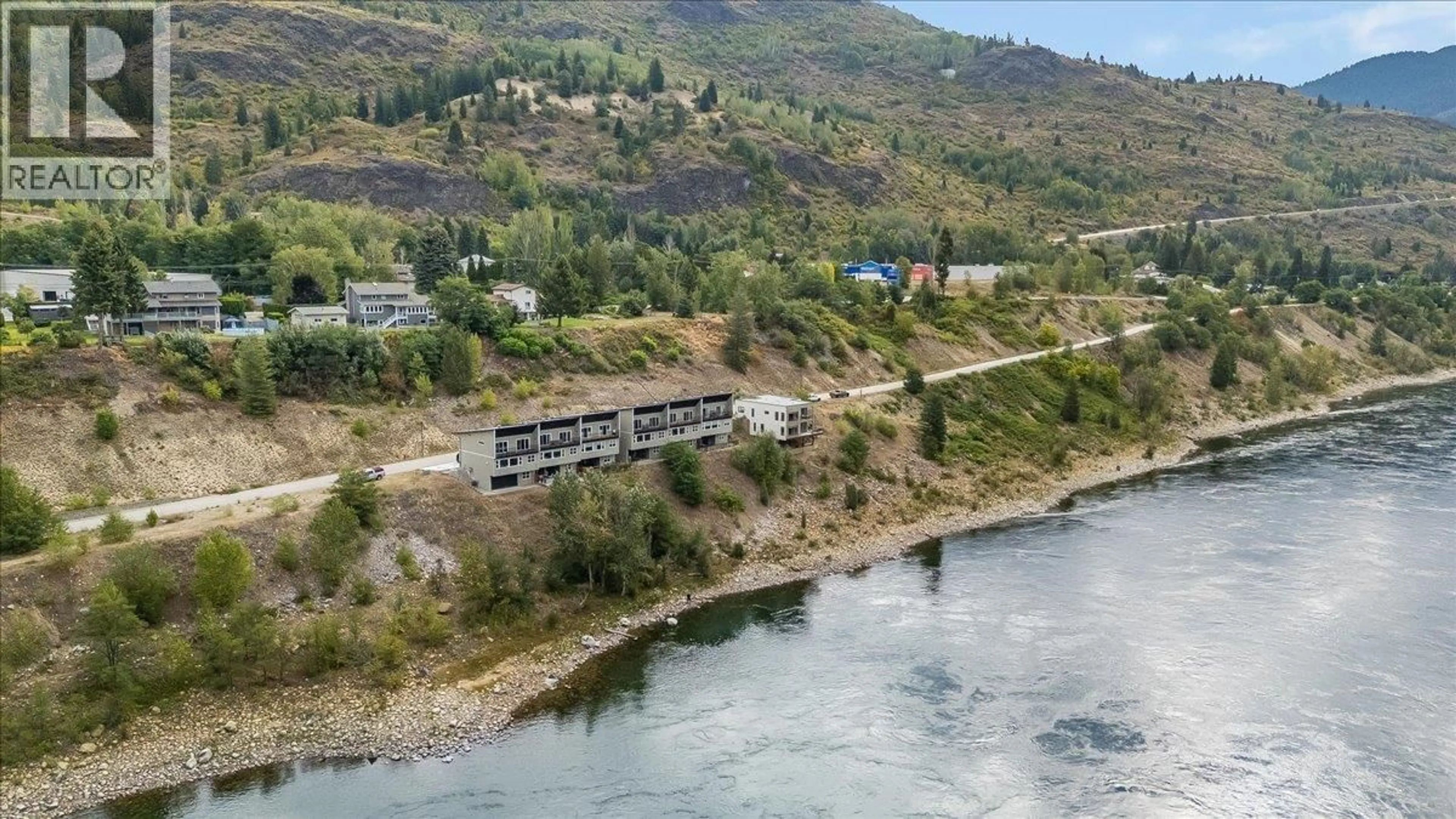 A pic from outside/outdoor area/front of a property/back of a property/a pic from drone, water/lake/river/ocean view for 8305 OLD WANETA ROAD, Trail British Columbia V1R4W9
