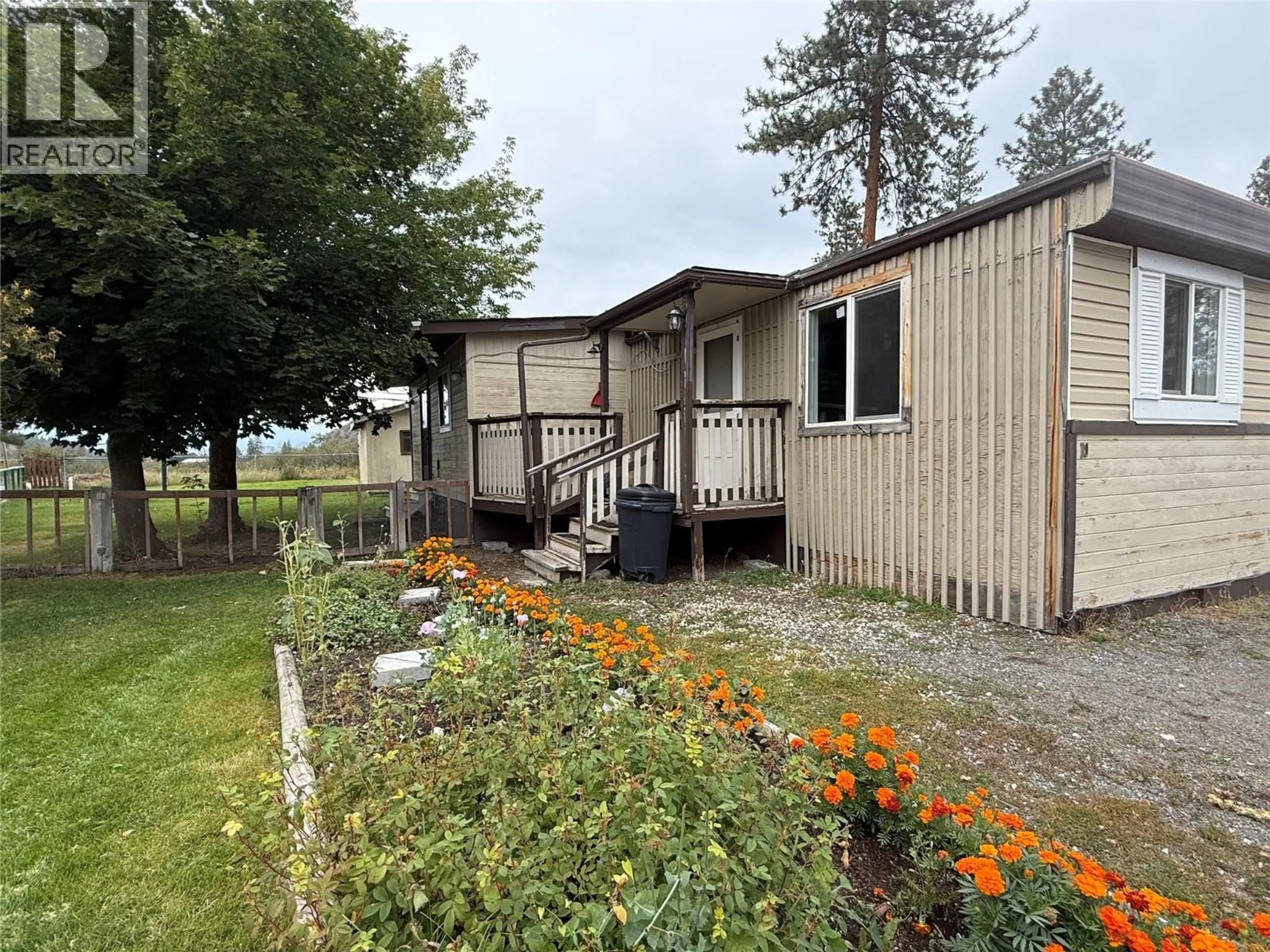A pic from outside/outdoor area/front of a property/back of a property/a pic from drone, unknown for 10 - 254 MERRITT SPENCES BRIDGE HIGHWAY, Merritt British Columbia V1K1M7