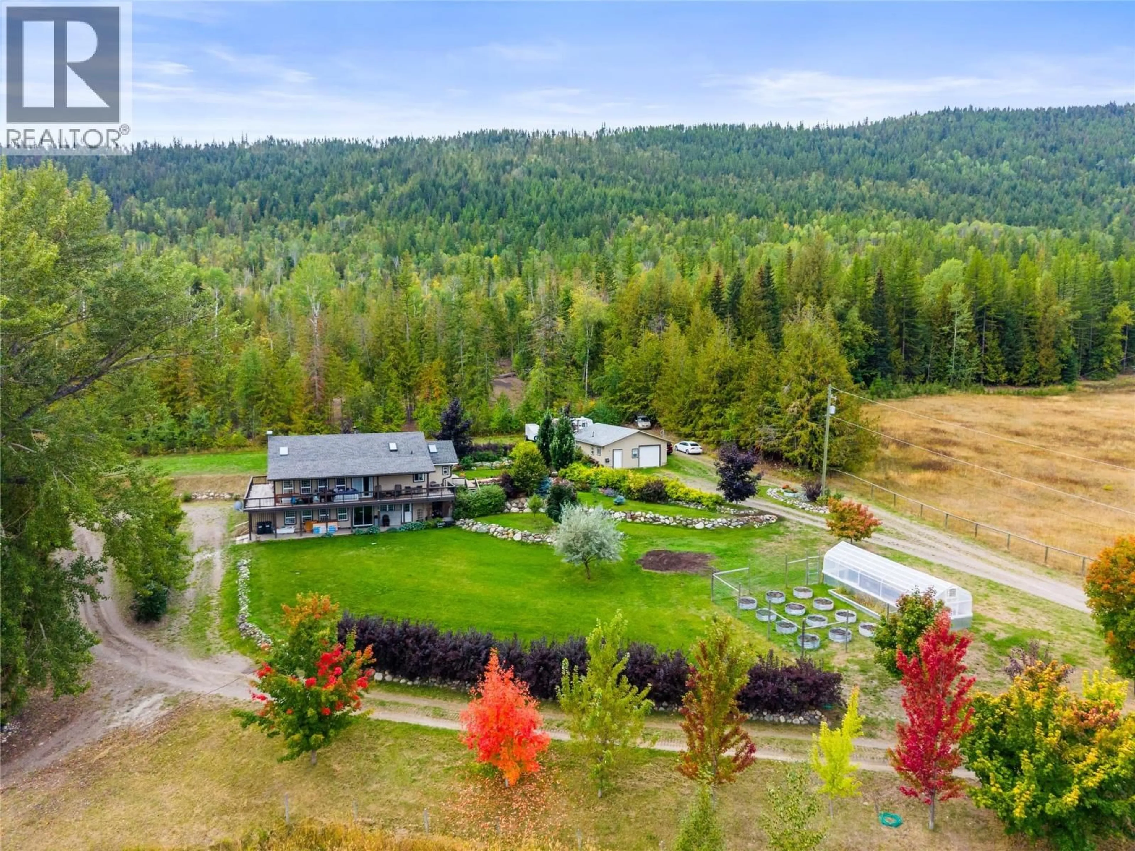 A pic from outside/outdoor area/front of a property/back of a property/a pic from drone, unknown for 5089A CEDAR HILL ROAD, Falkland British Columbia V0E1W0
