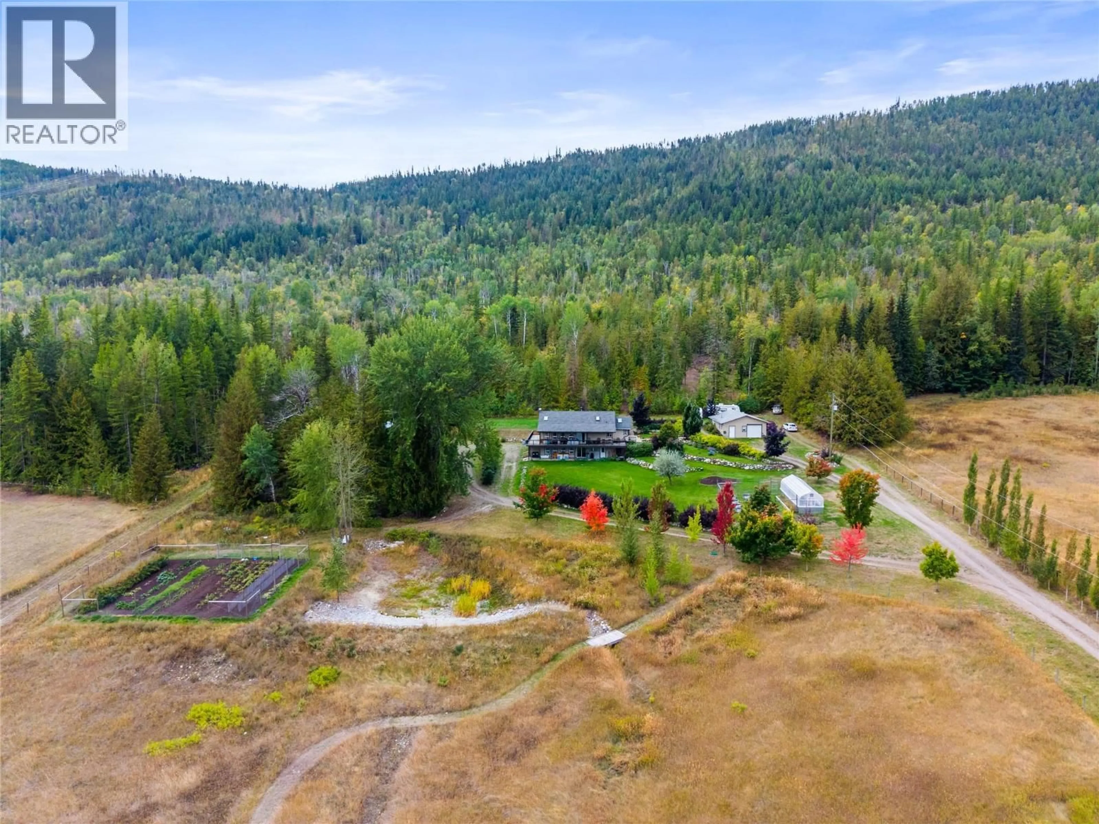 A pic from outside/outdoor area/front of a property/back of a property/a pic from drone, mountain view for 5089A CEDAR HILL ROAD, Falkland British Columbia V0E1W0