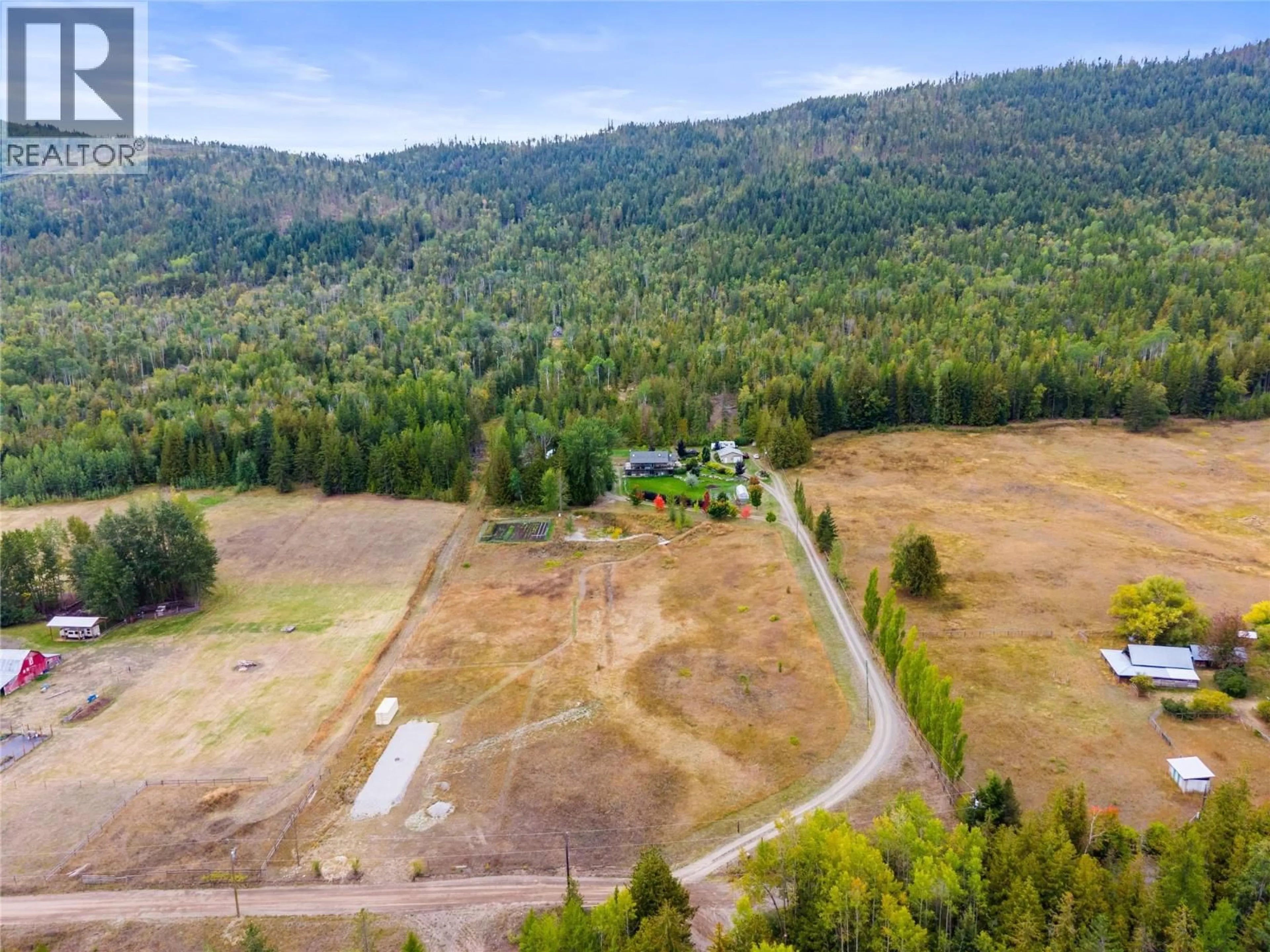 A pic from outside/outdoor area/front of a property/back of a property/a pic from drone, mountain view for 5089A CEDAR HILL ROAD, Falkland British Columbia V0E1W0