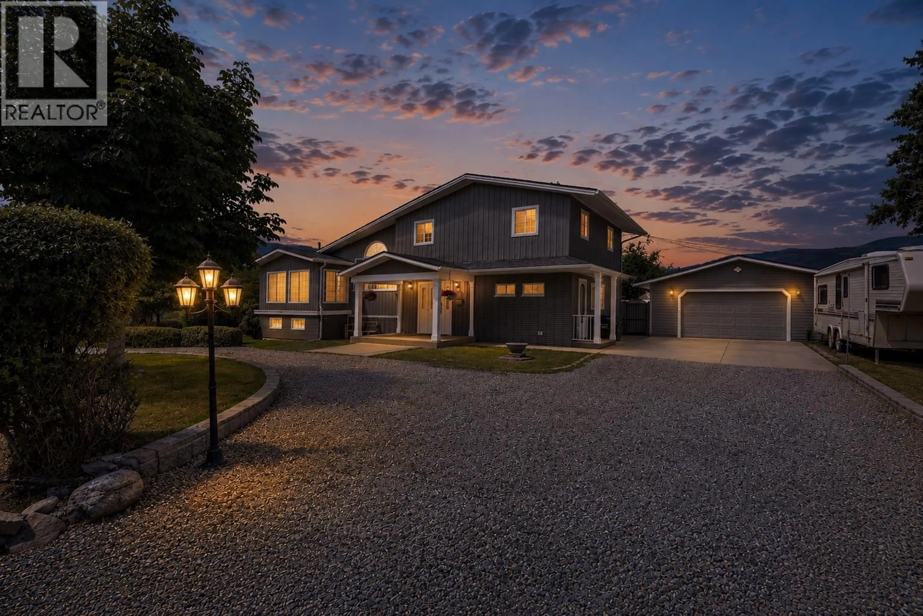 A pic from outside/outdoor area/front of a property/back of a property/a pic from drone, street for 125 CORRY PLACE, Penticton British Columbia V2A3S2