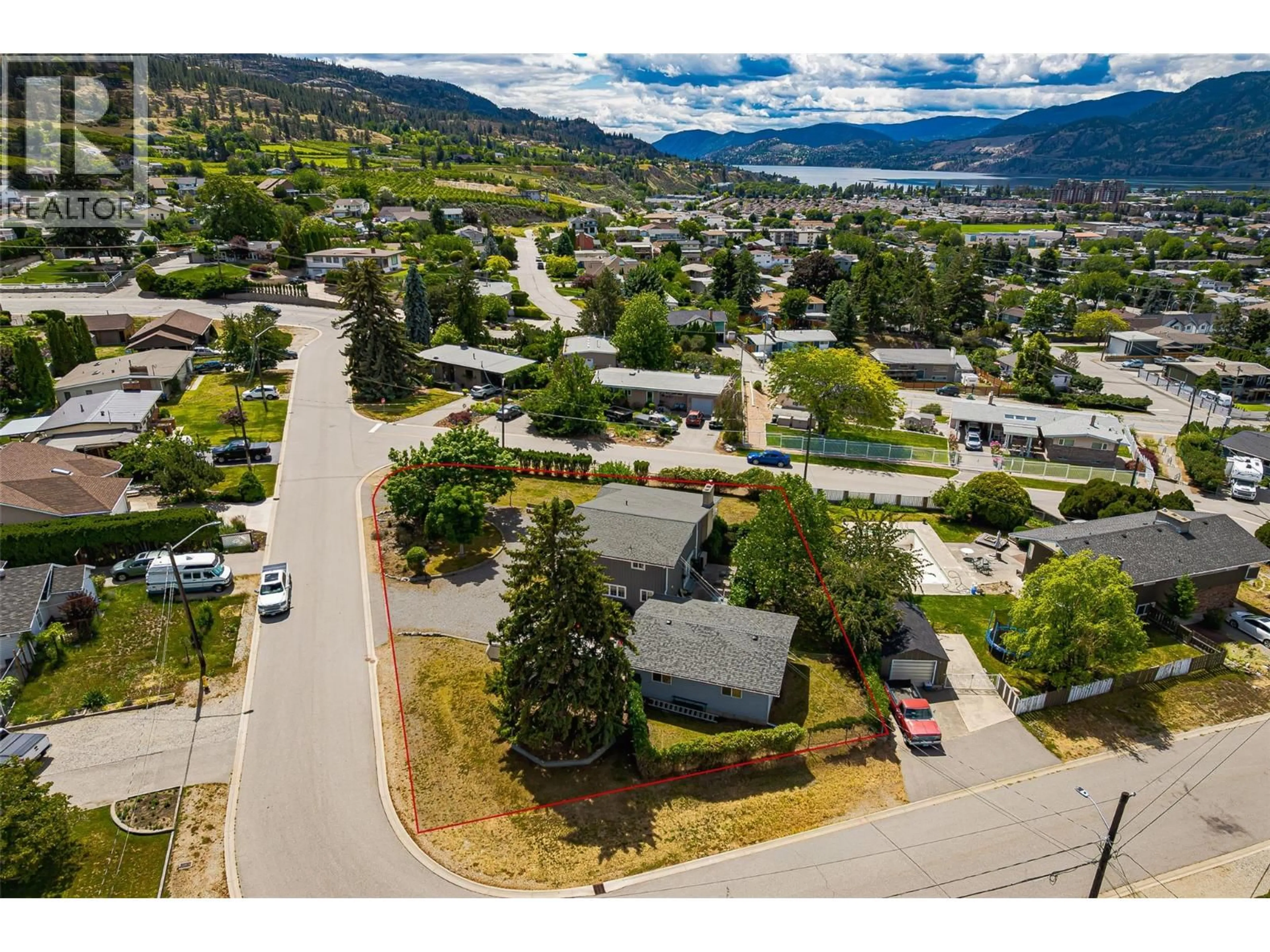 A pic from outside/outdoor area/front of a property/back of a property/a pic from drone, mountain view for 125 CORRY PLACE, Penticton British Columbia V2A3S2