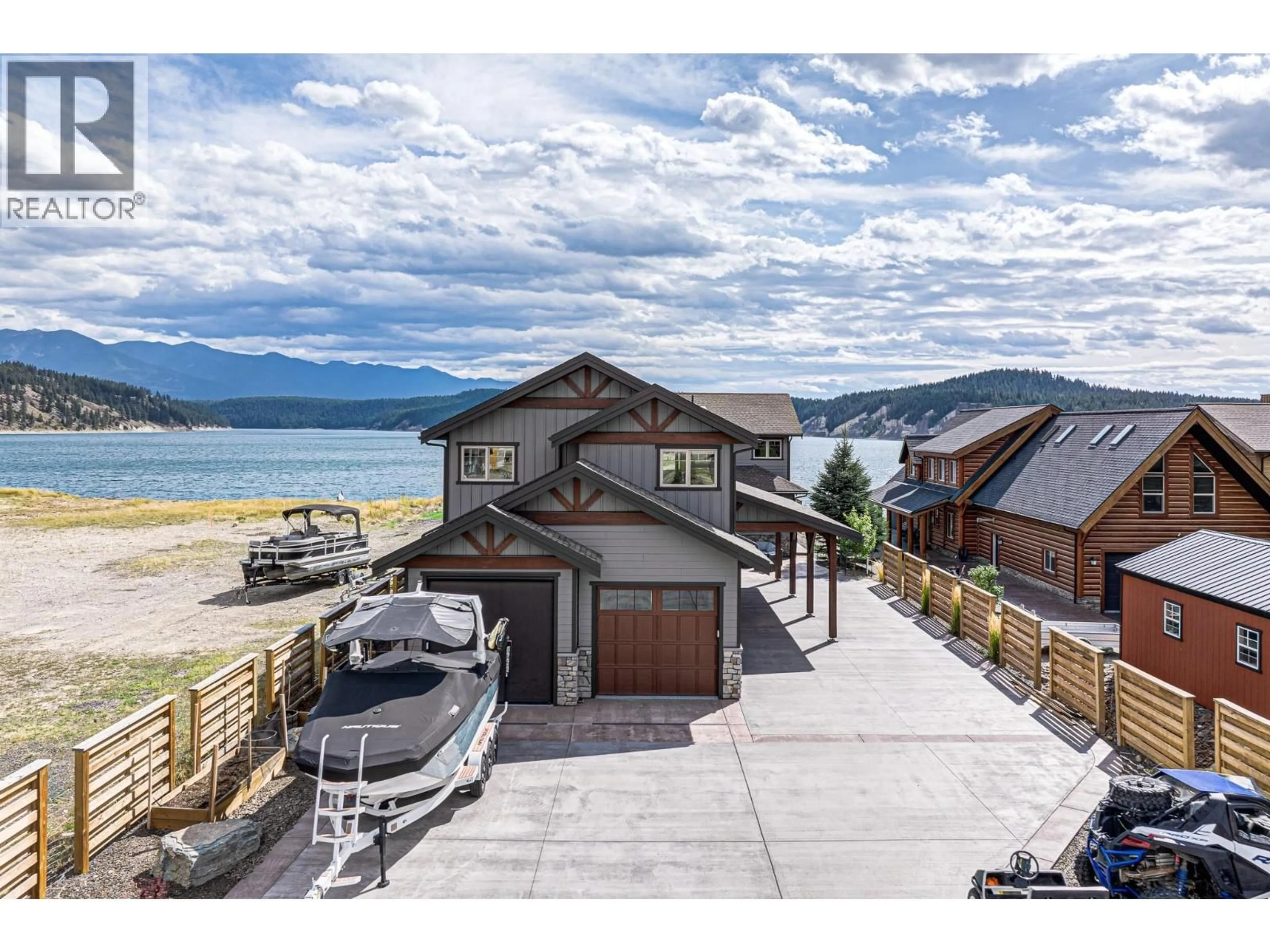 A pic from outside/outdoor area/front of a property/back of a property/a pic from drone, water/lake/river/ocean view for 1674 KOOCANUSA LAKE DRIVE, Lake Koocanusa British Columbia V0B1T4